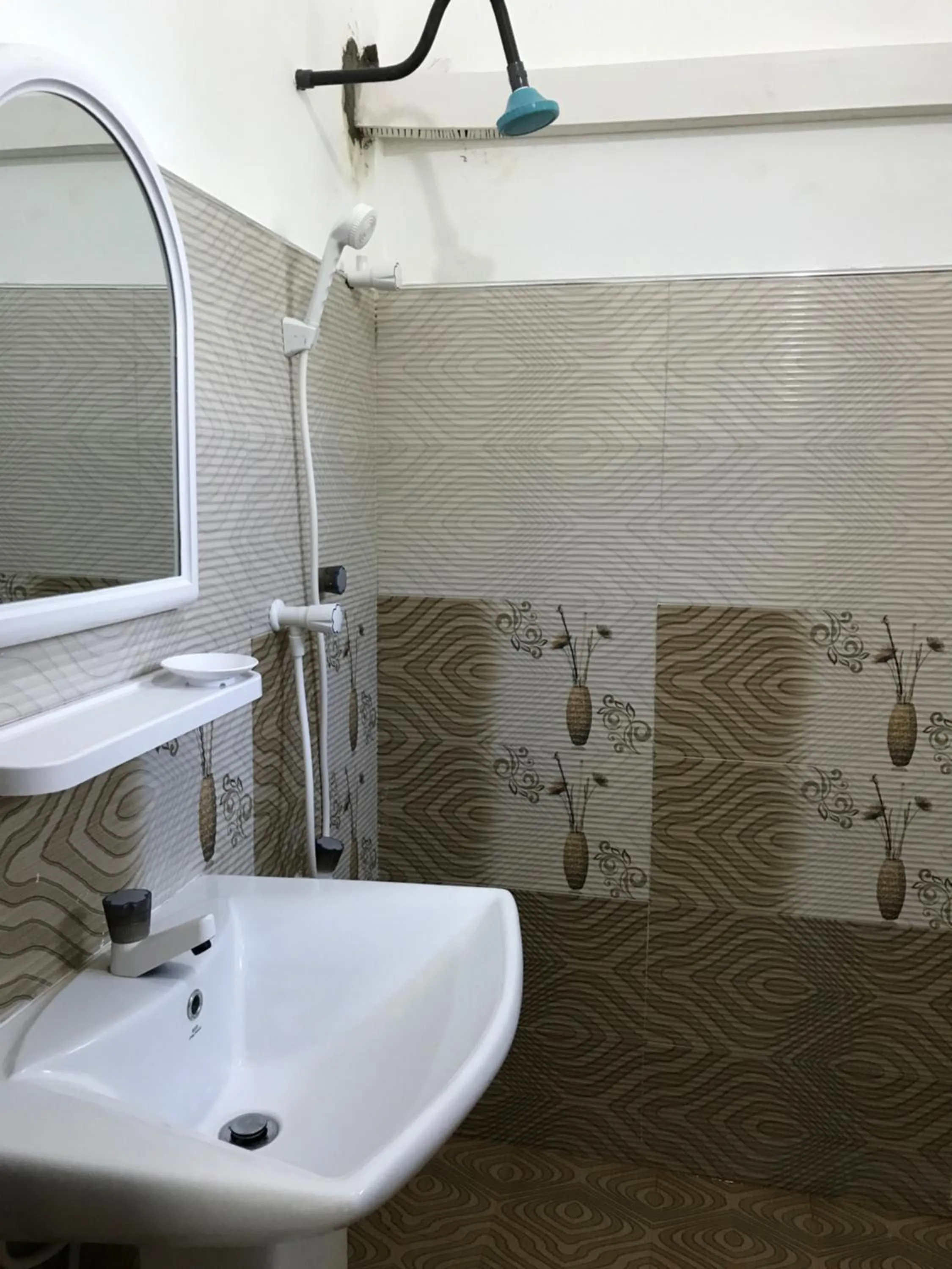 Bathroom in Nice Place Beach Hotel