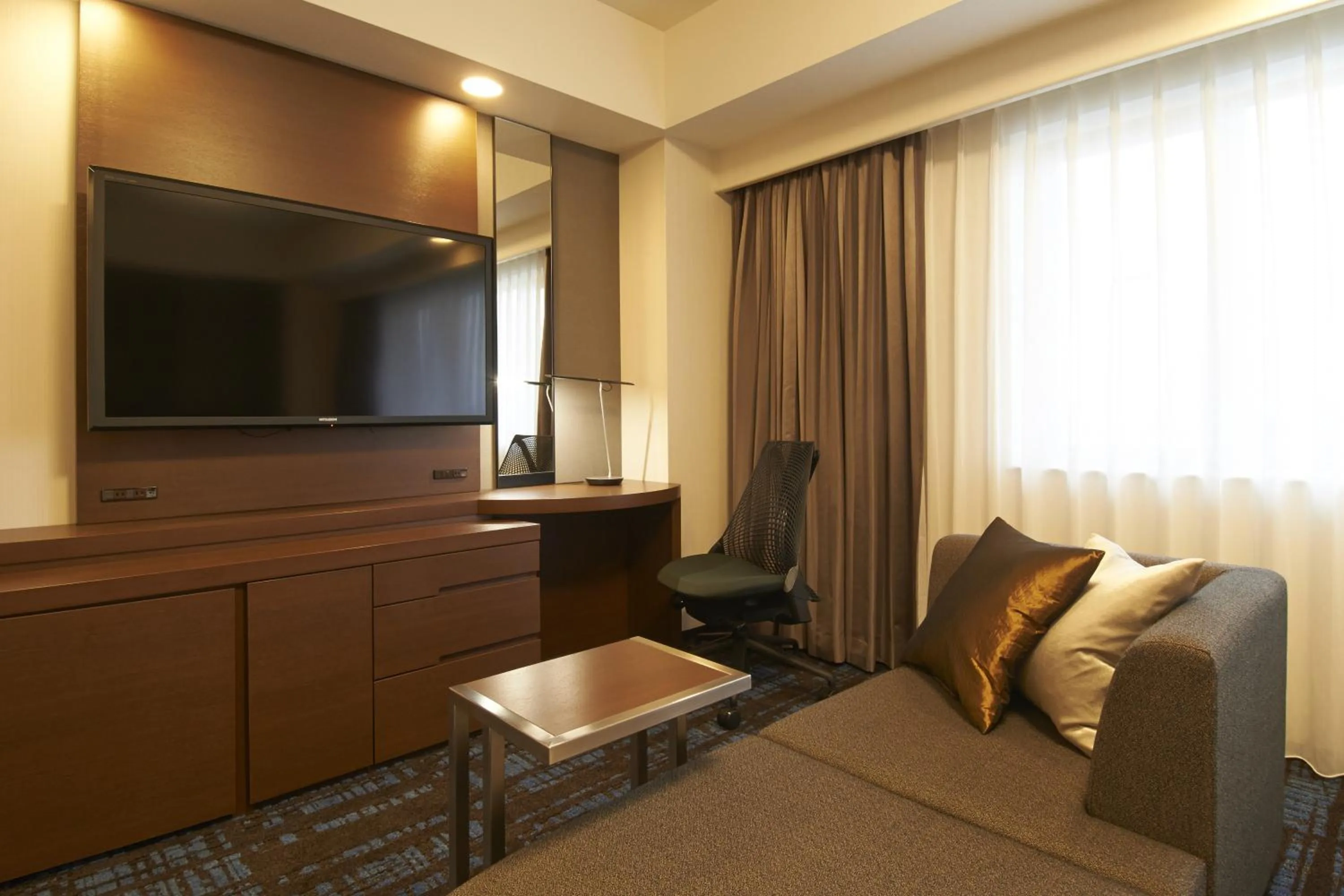 Living room in HOTEL VISCHIO AMAGASAKI by GRANVIA