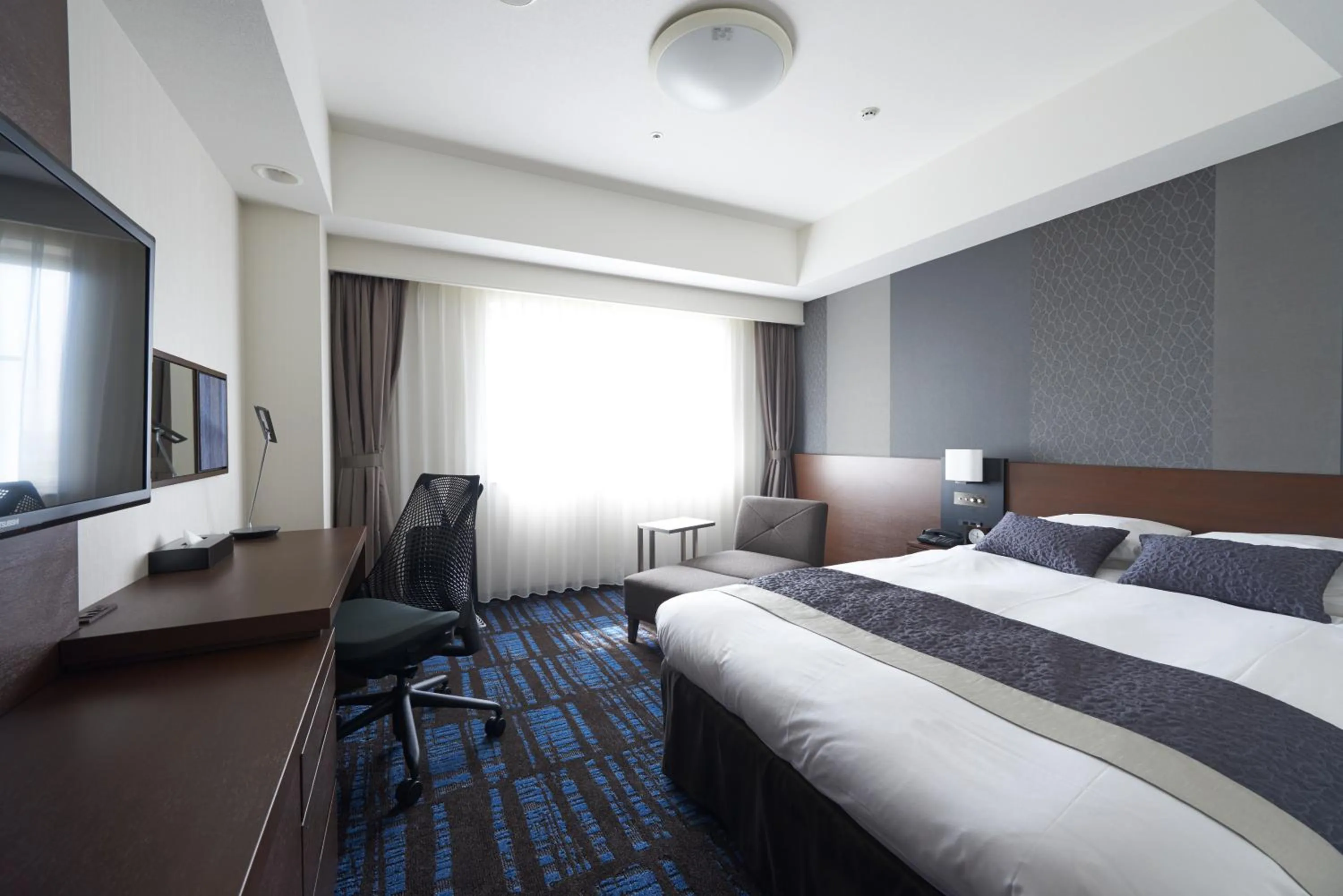 Photo of the whole room, Bed in HOTEL VISCHIO AMAGASAKI by GRANVIA