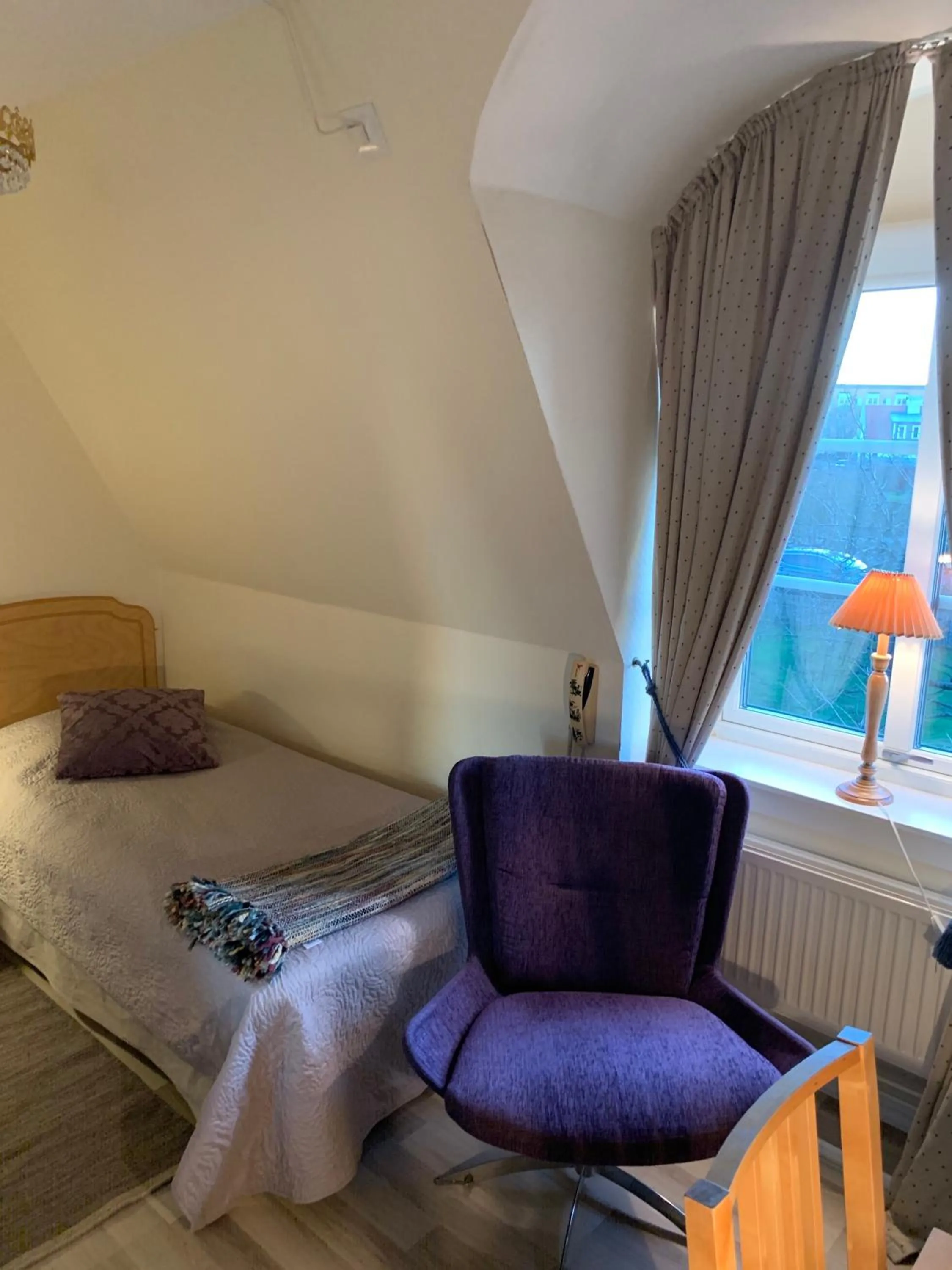 Bed in Nya Pallas Hotel