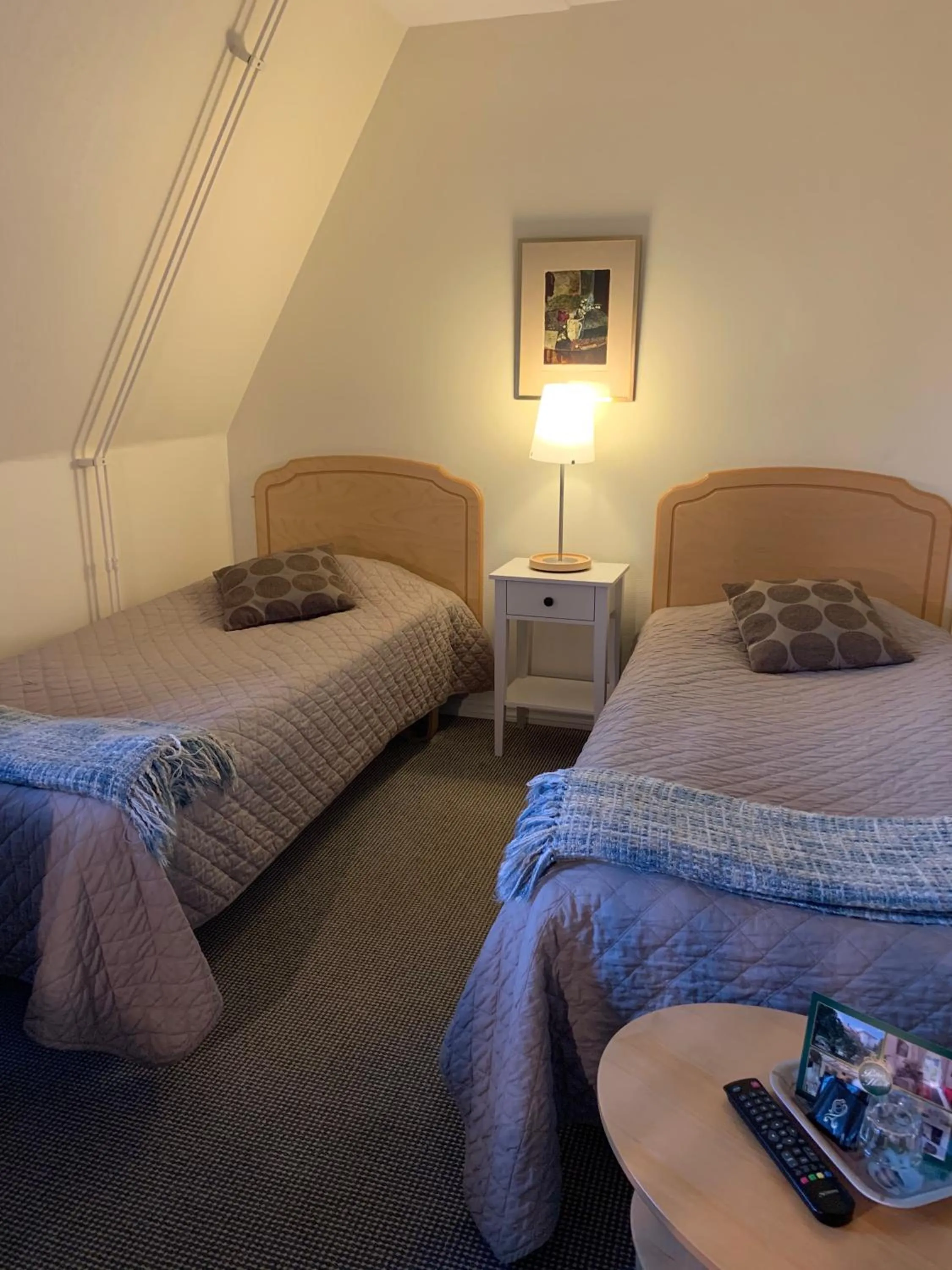 Bed in Nya Pallas Hotel