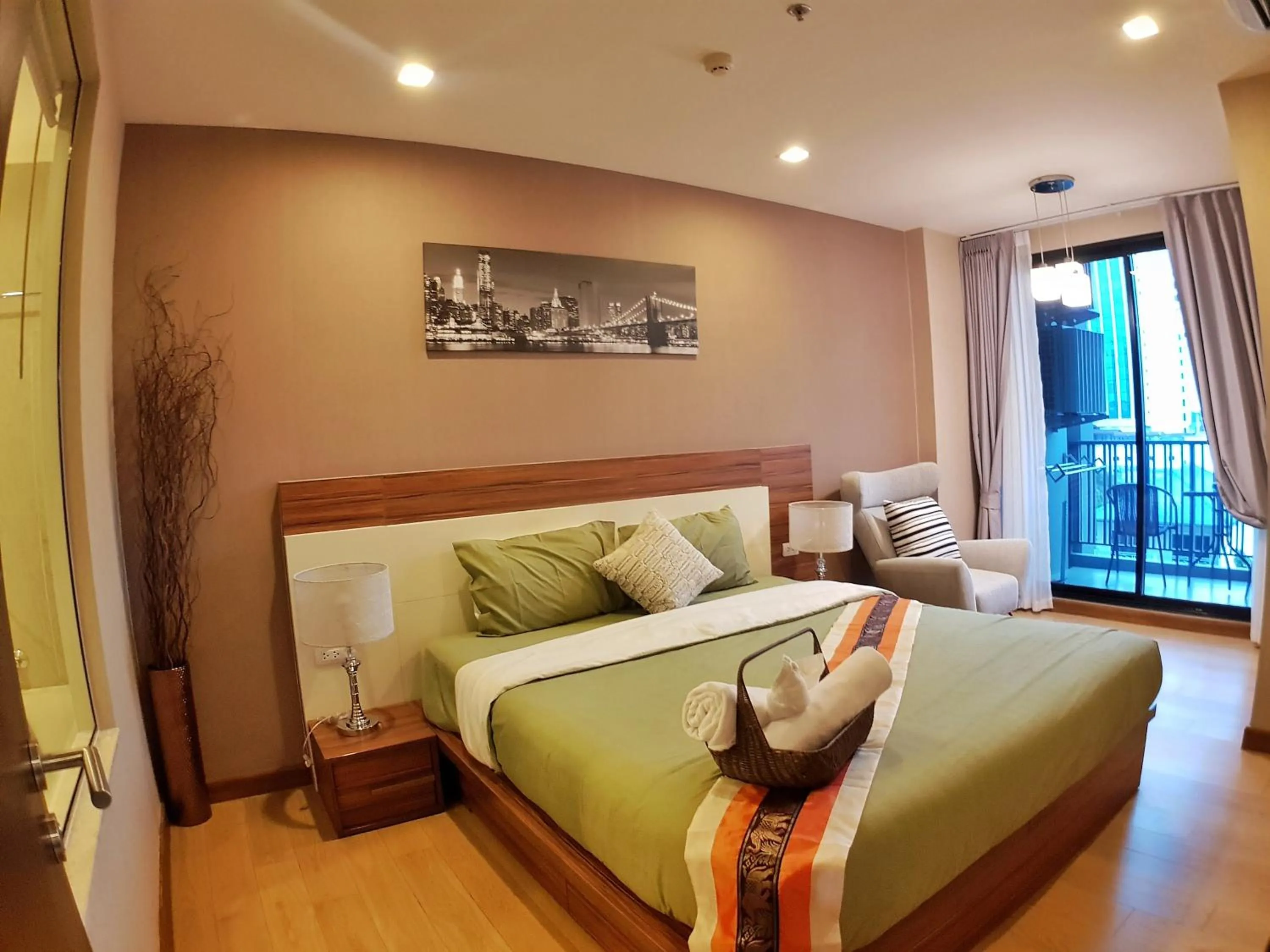 Bed in Astra Suites Night Bazaar