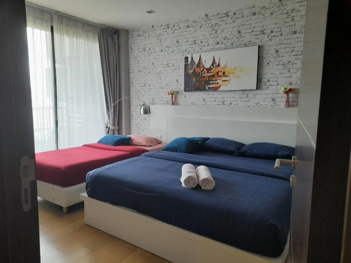 Bed in Astra Suites Night Bazaar