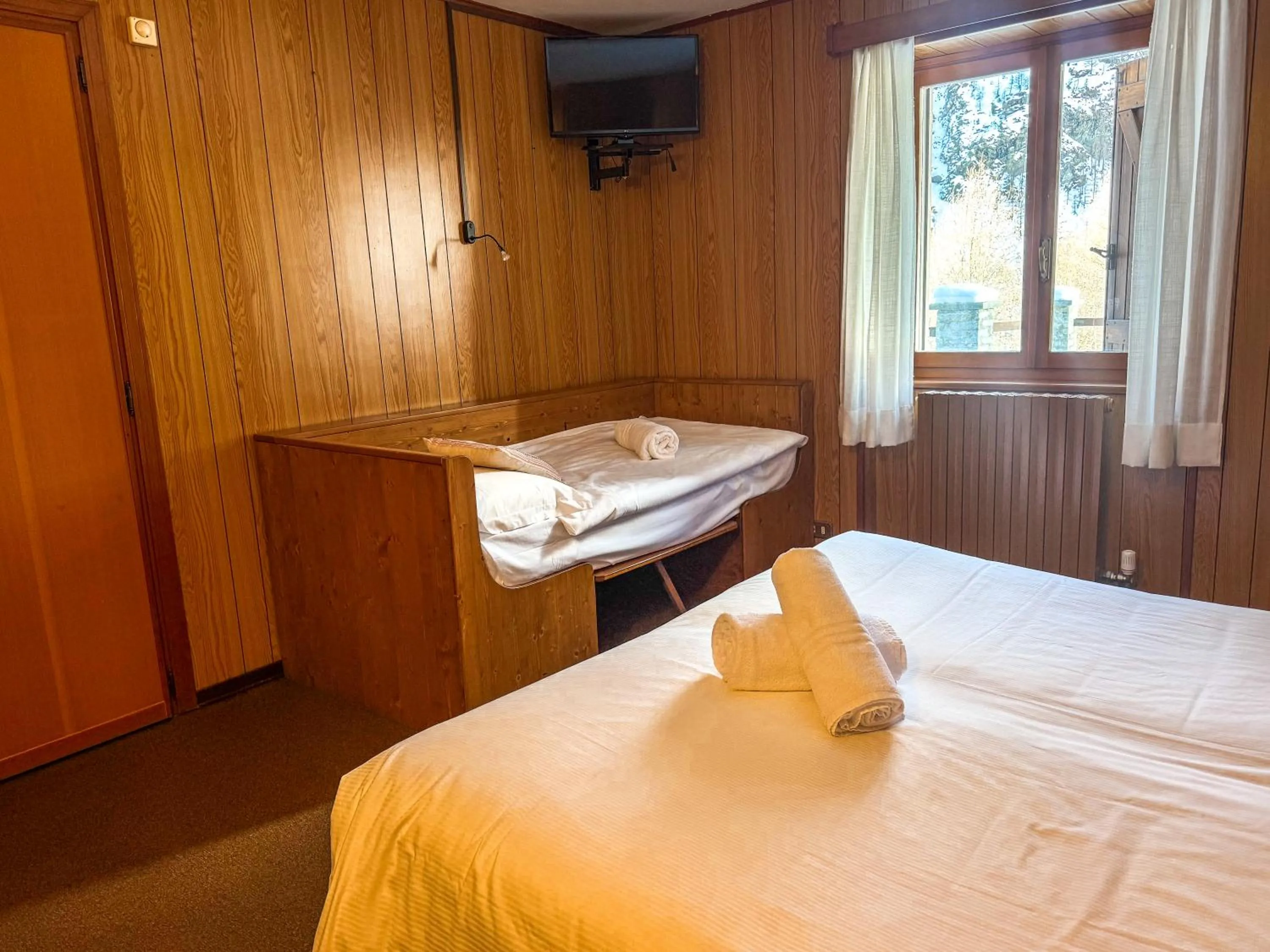 Bed in Locanda del Lysjoch