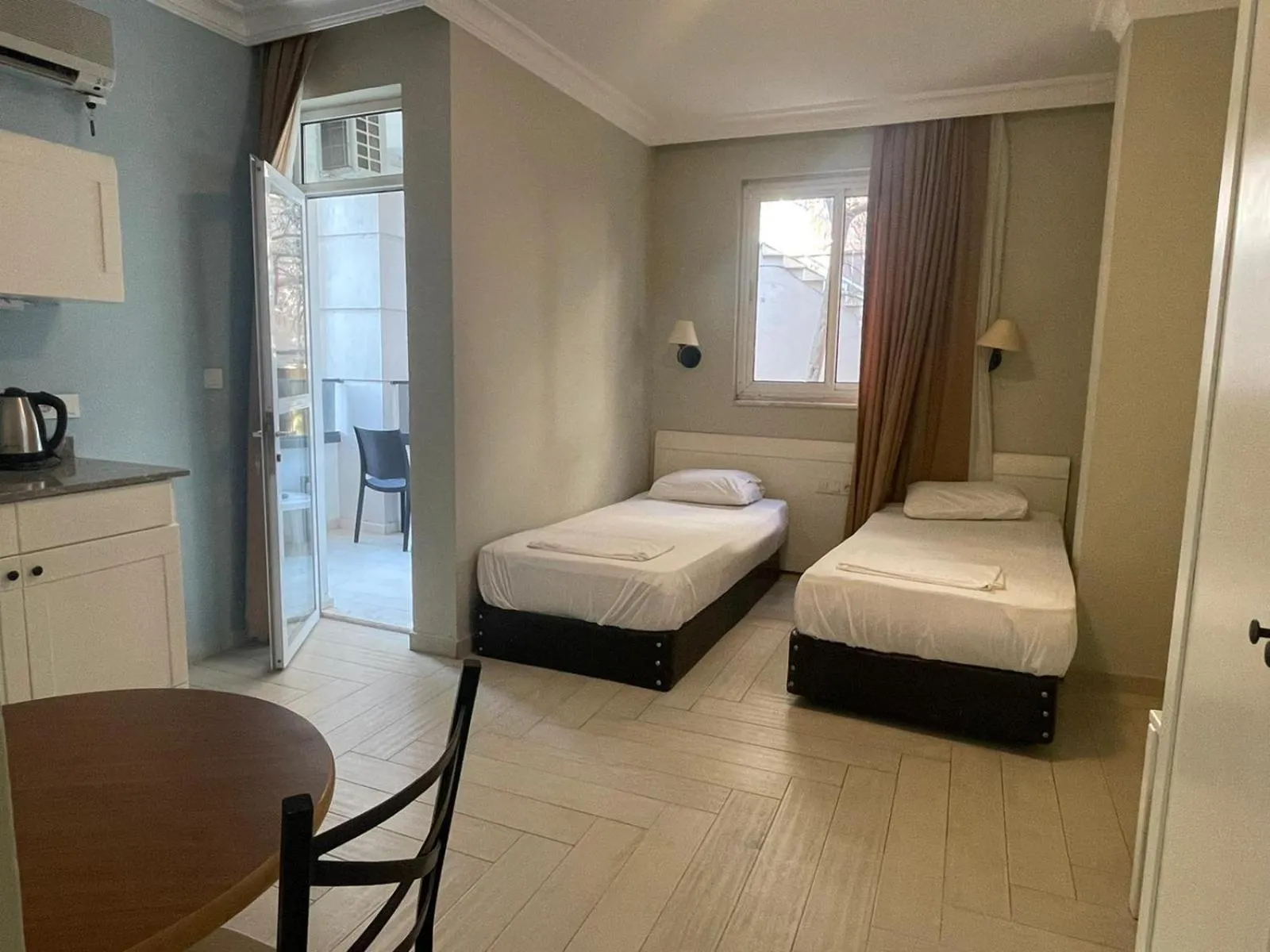 Bed in Two Seas Hotel