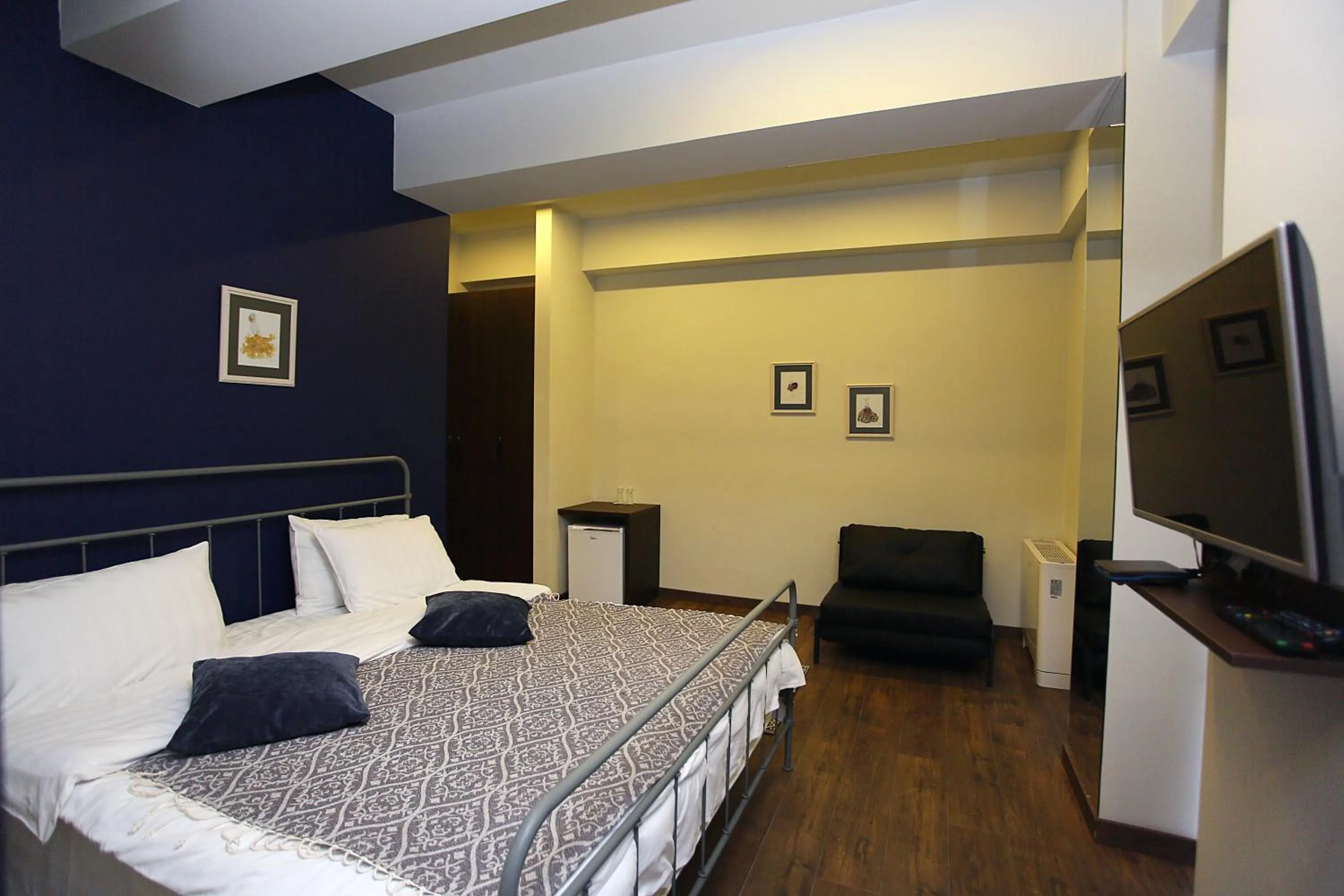 Bed in L.M Club Hotel