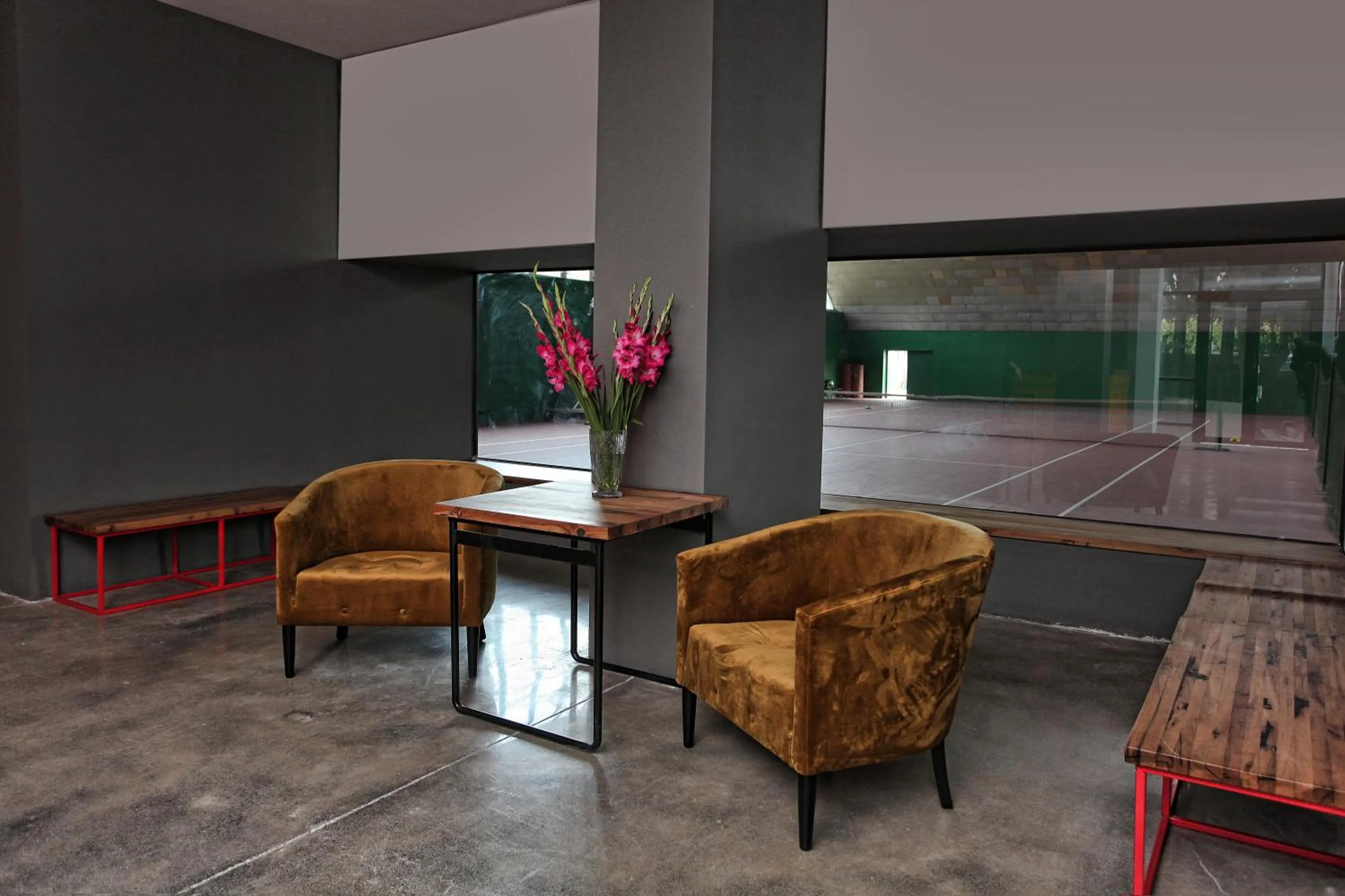 Communal lounge/ TV room in L.M Club Hotel