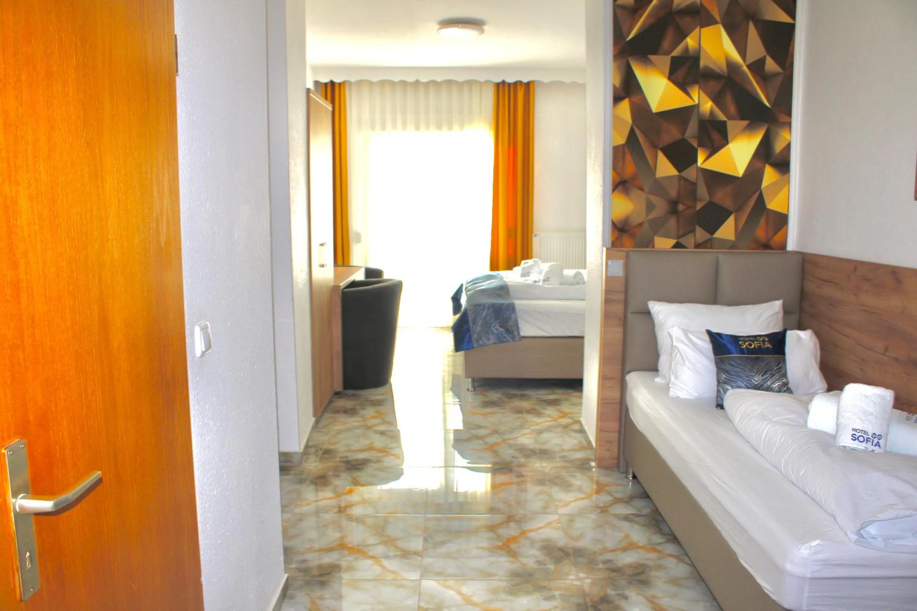 Living room, Bed in Hotel Sofia