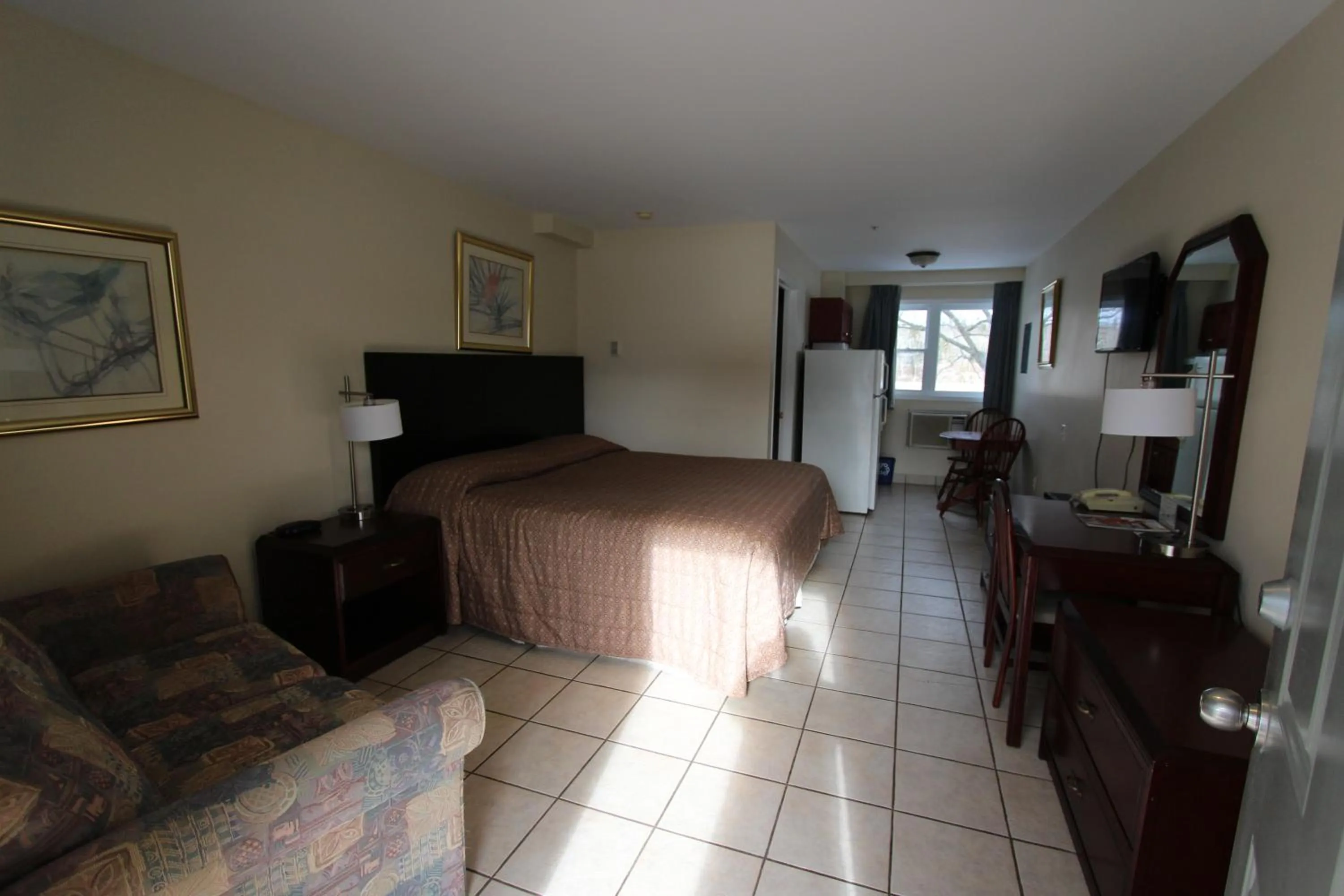 Photo of the whole room, Bed in Stardust Motel - Timberlea
