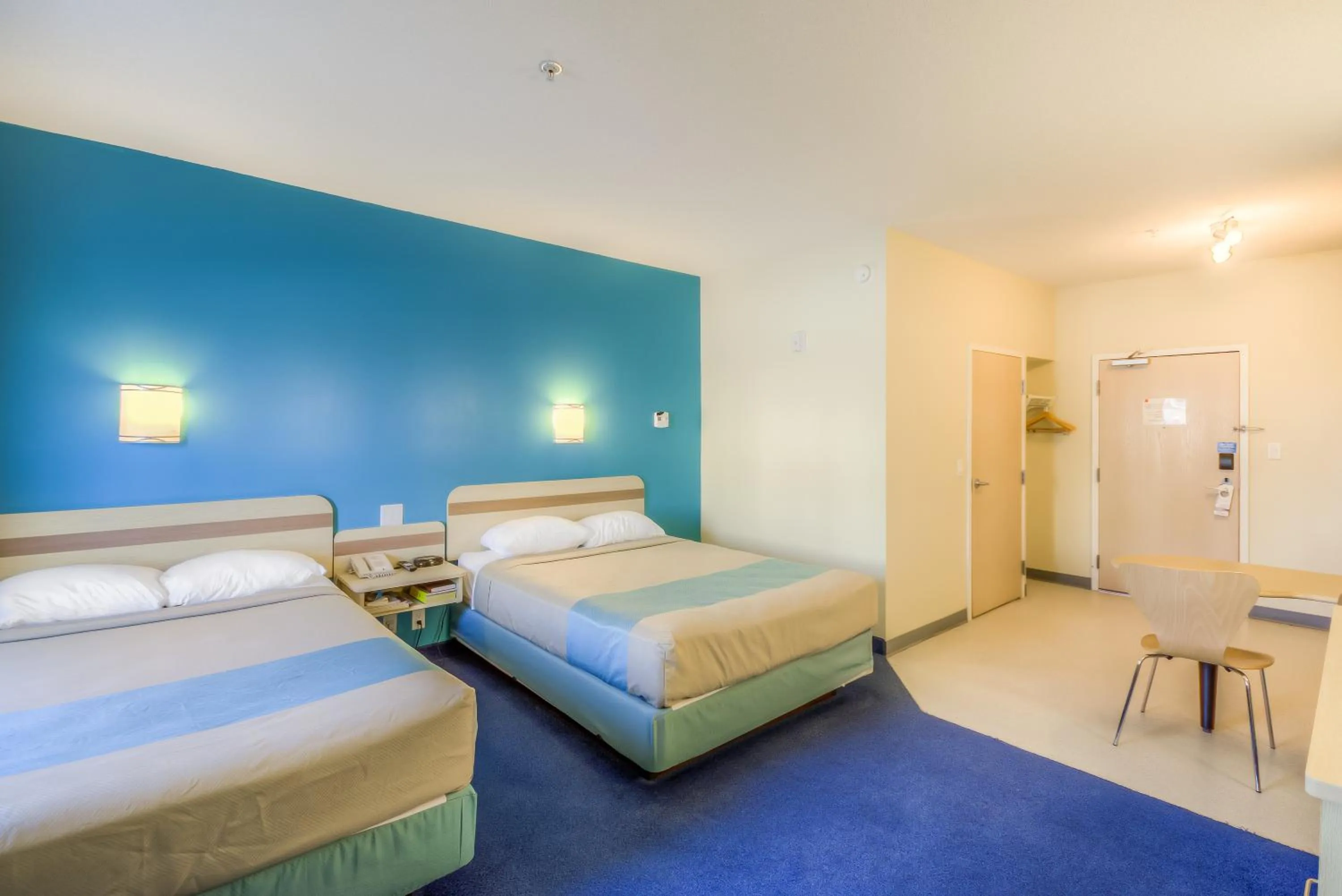 Bed in Aurora Inn Estevan