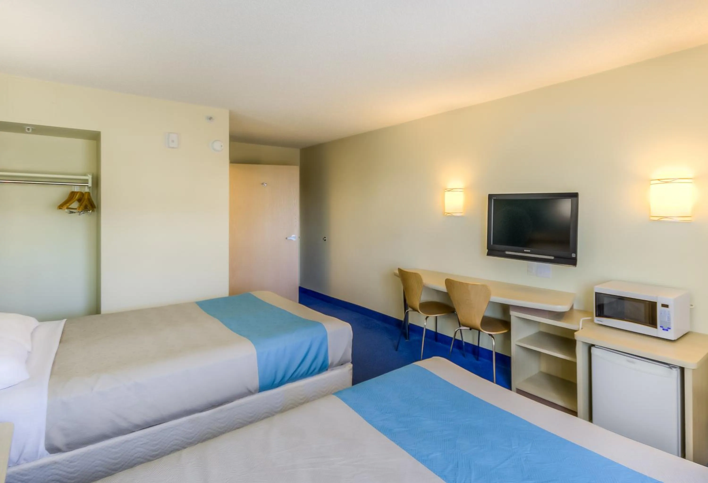 Bed in Aurora Inn Estevan