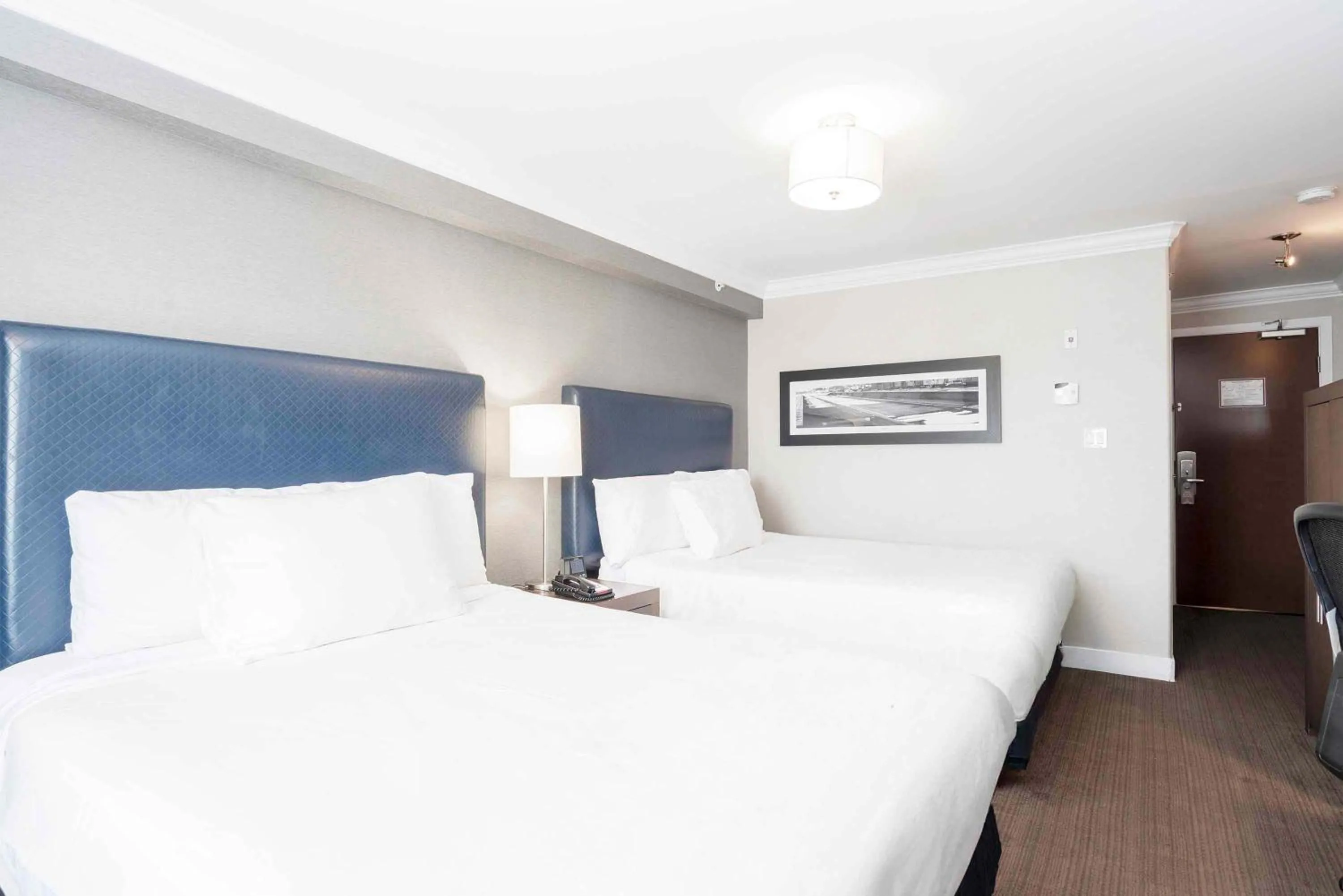 Photo of the whole room, Bed in Sandman Signature Prince George Hotel