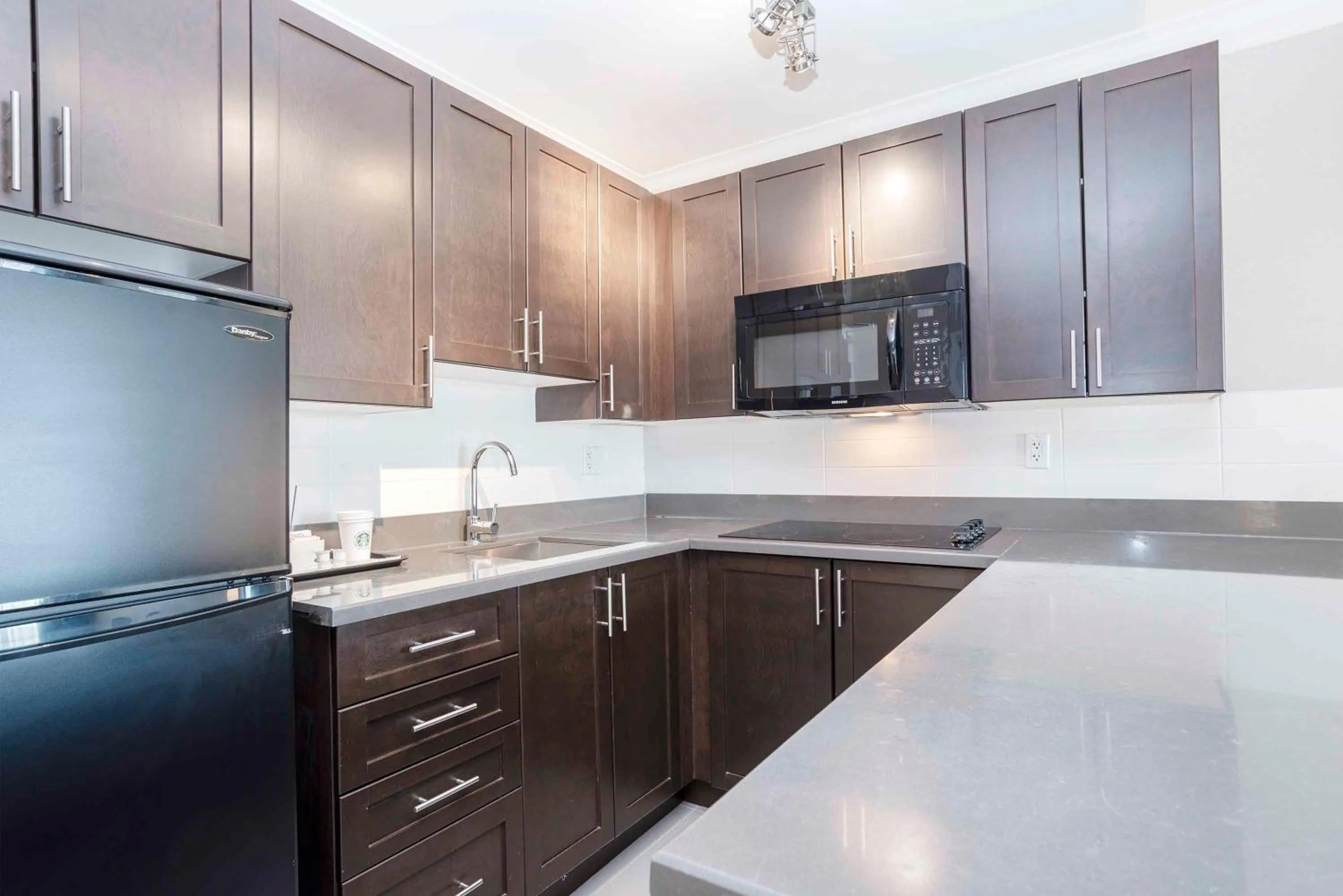 Kitchen or kitchenette in Sandman Signature Prince George Hotel