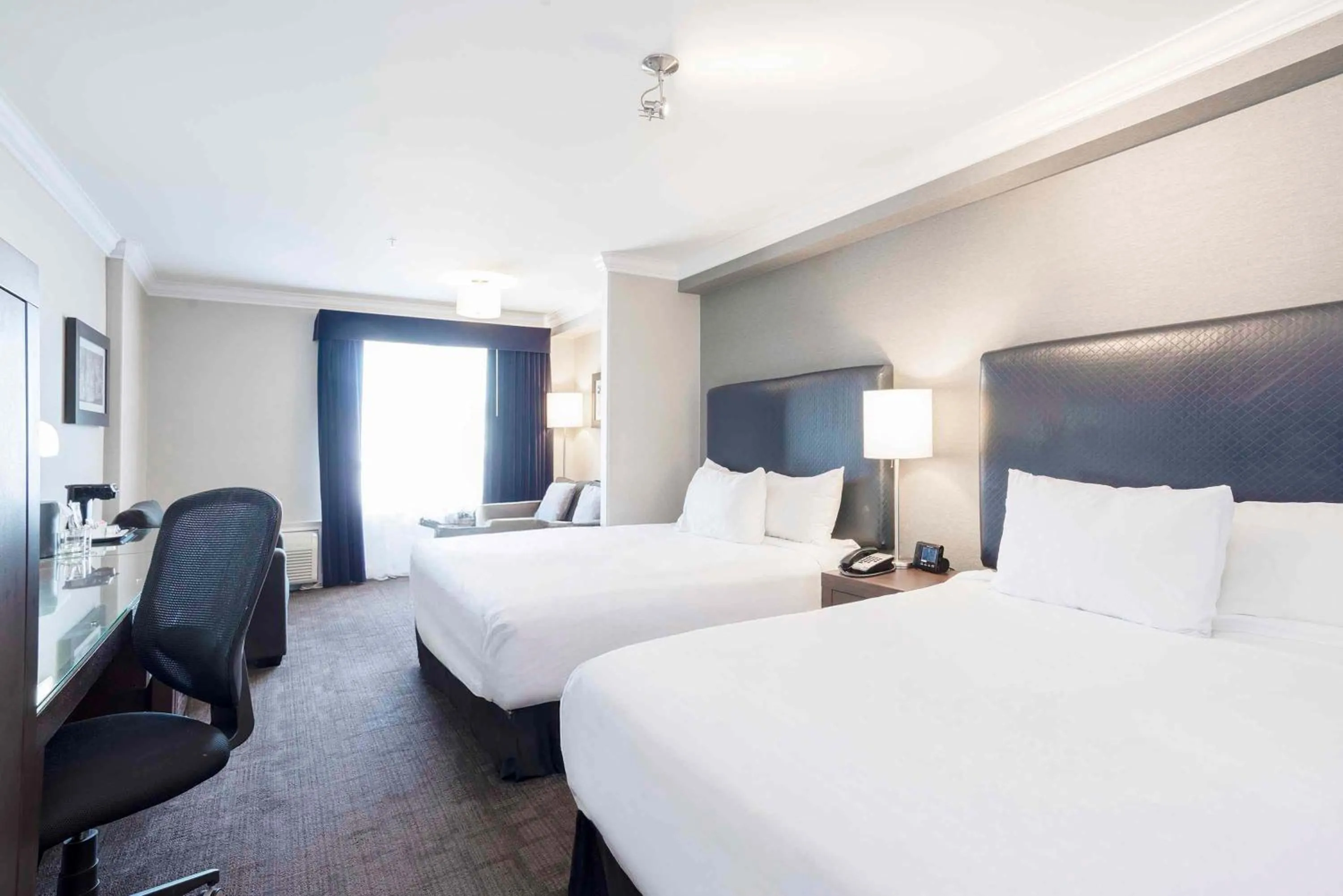 Photo of the whole room, Bed in Sandman Signature Prince George Hotel