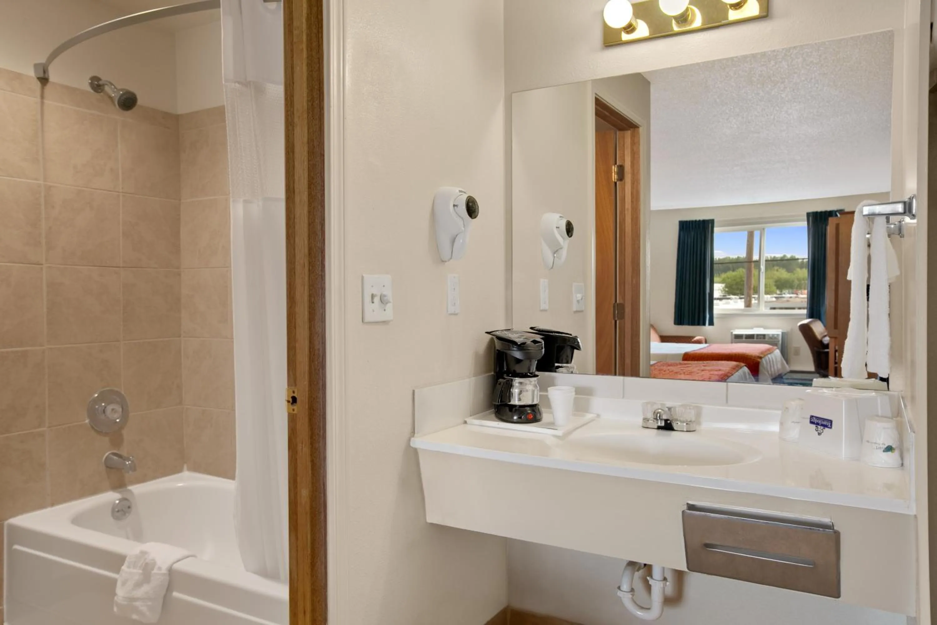 Bathroom in Travelodge by Wyndham Port of Tacoma WA