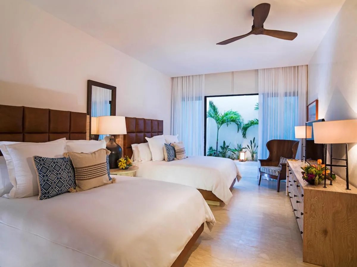 Bed in Chileno Bay Resort & Residences, Auberge Collection