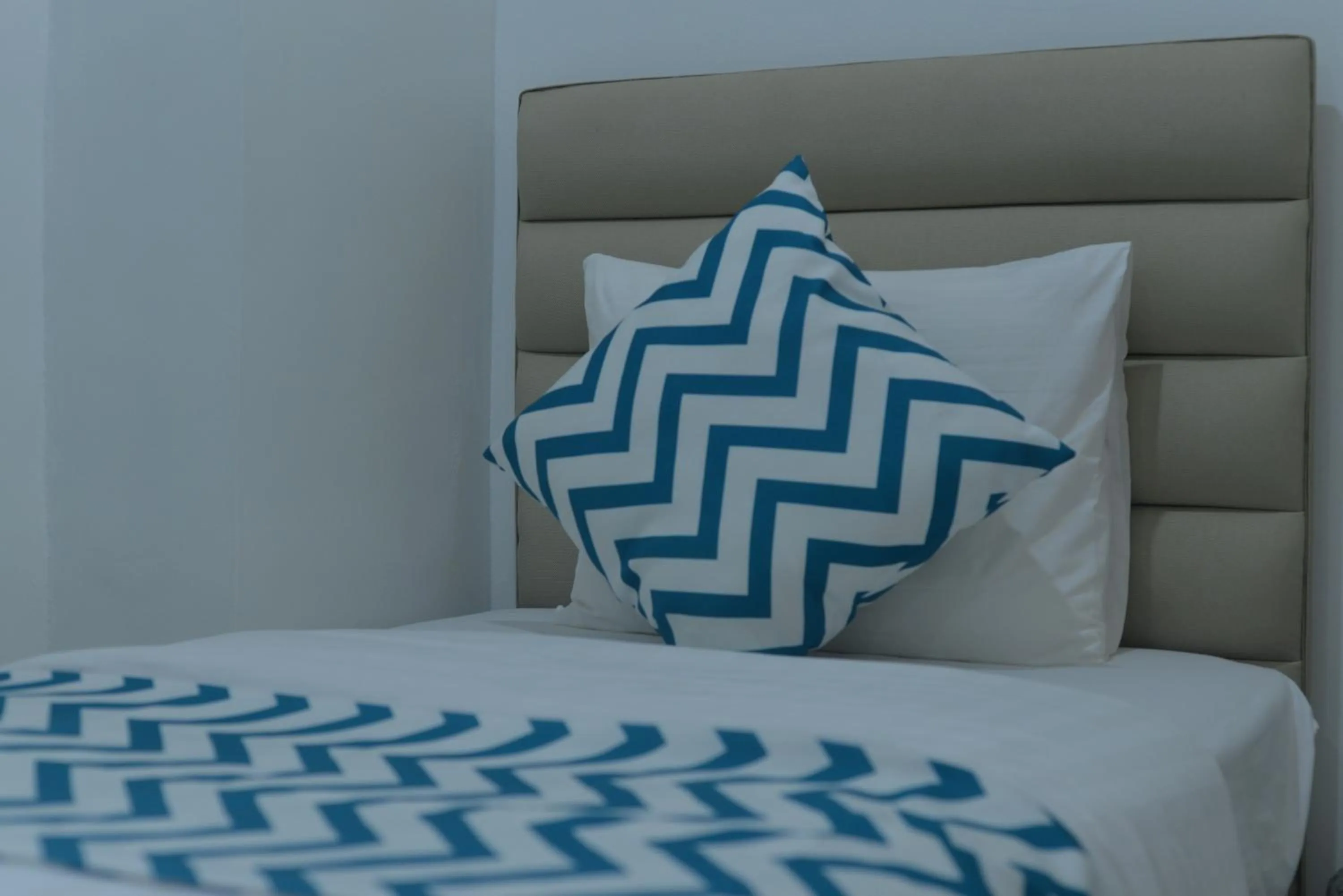 Bed in Grand Blue Beach Hotel