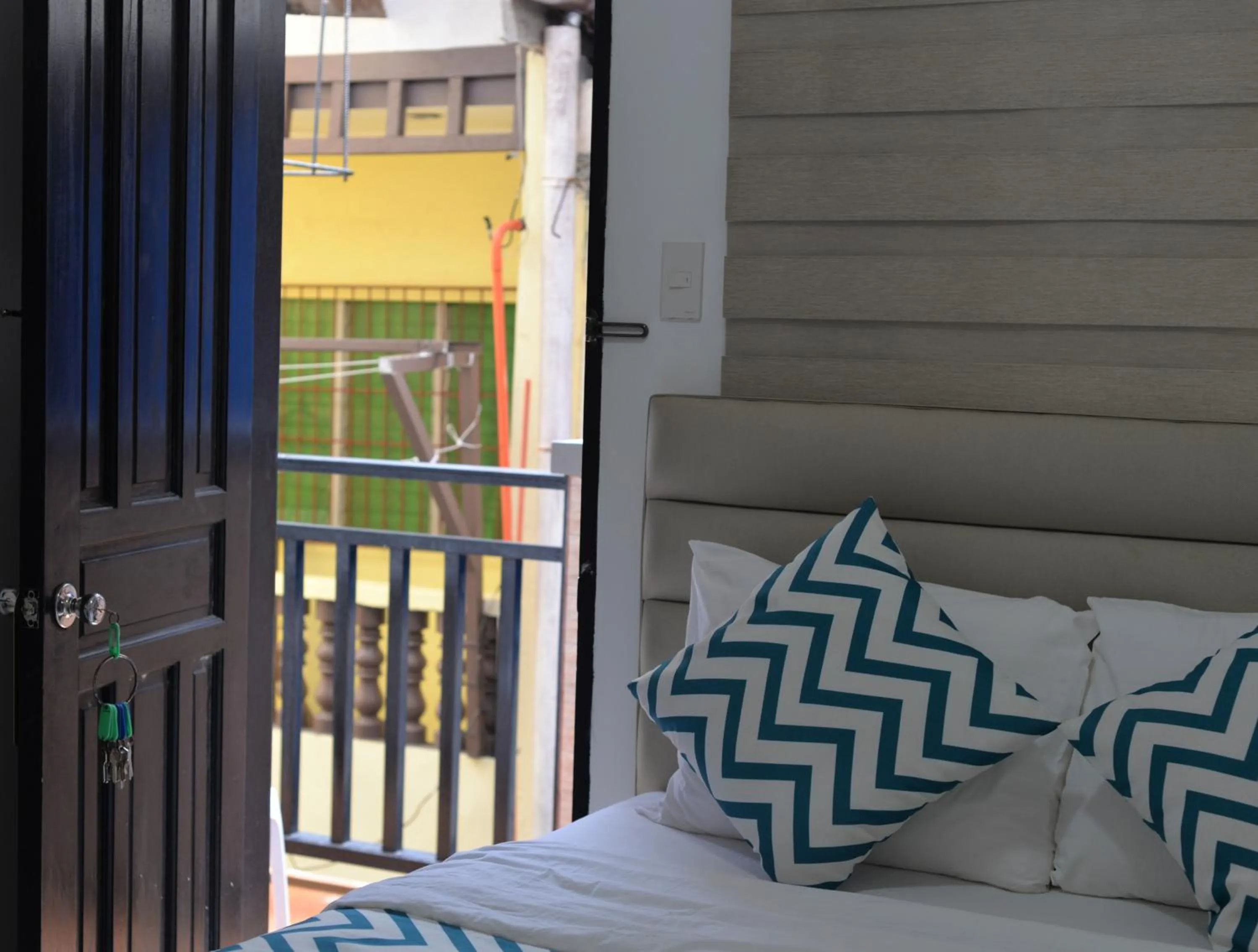 Bed in Grand Blue Beach Hotel