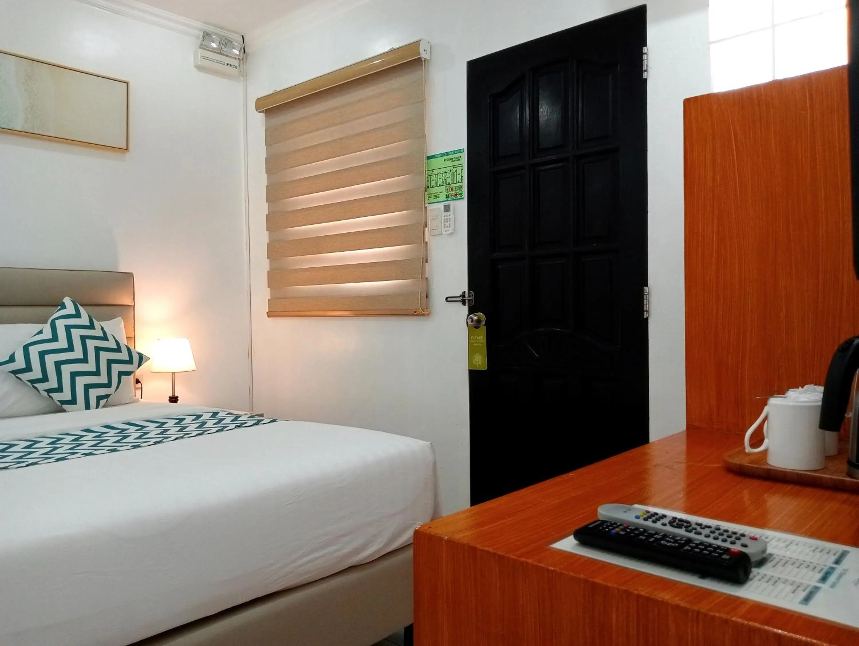 Bed in Grand Blue Beach Hotel