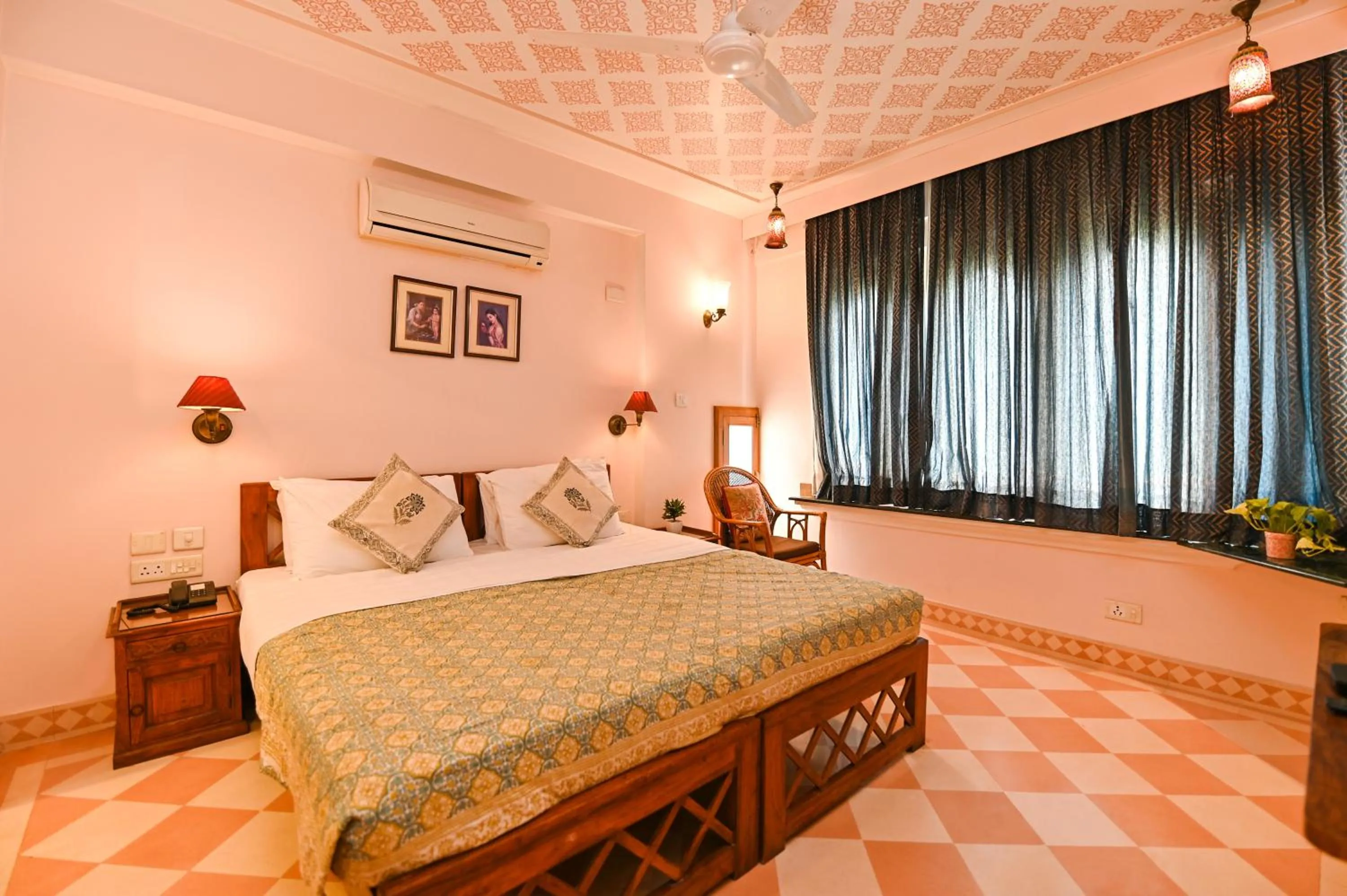 Bed in Om Niwas Suite Hotel
