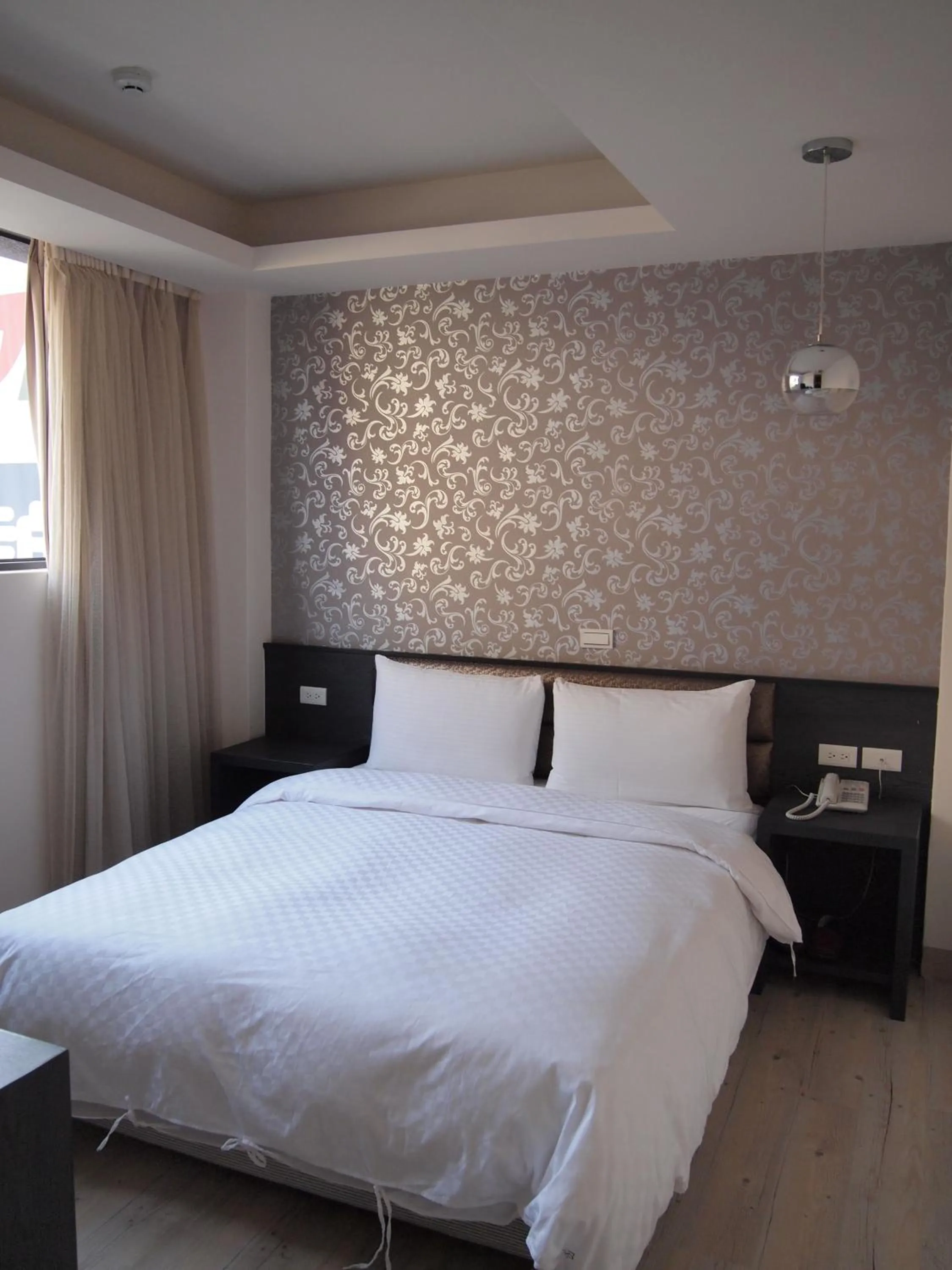 Bed in Jinbao Hotel