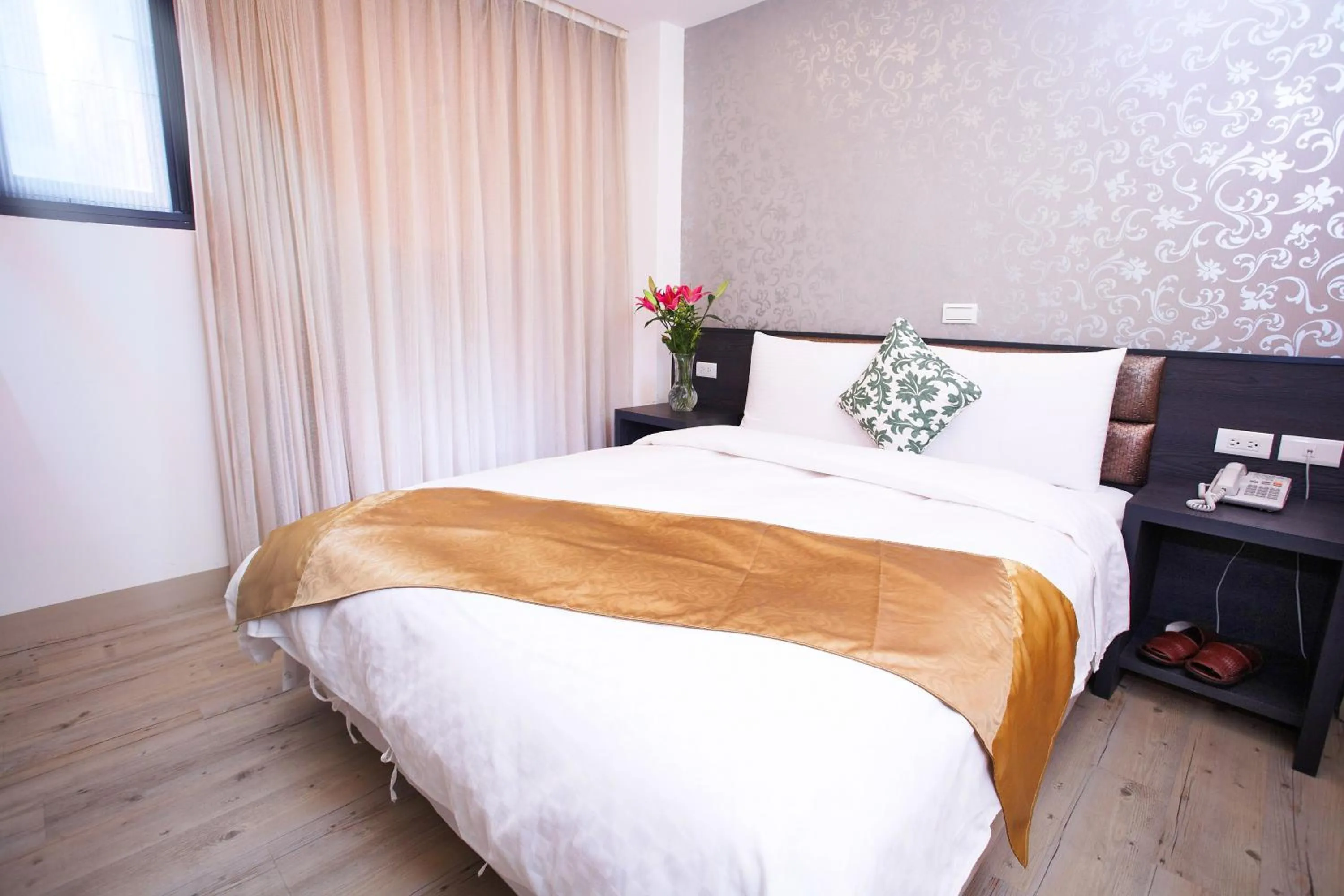 Bed in Jinbao Hotel