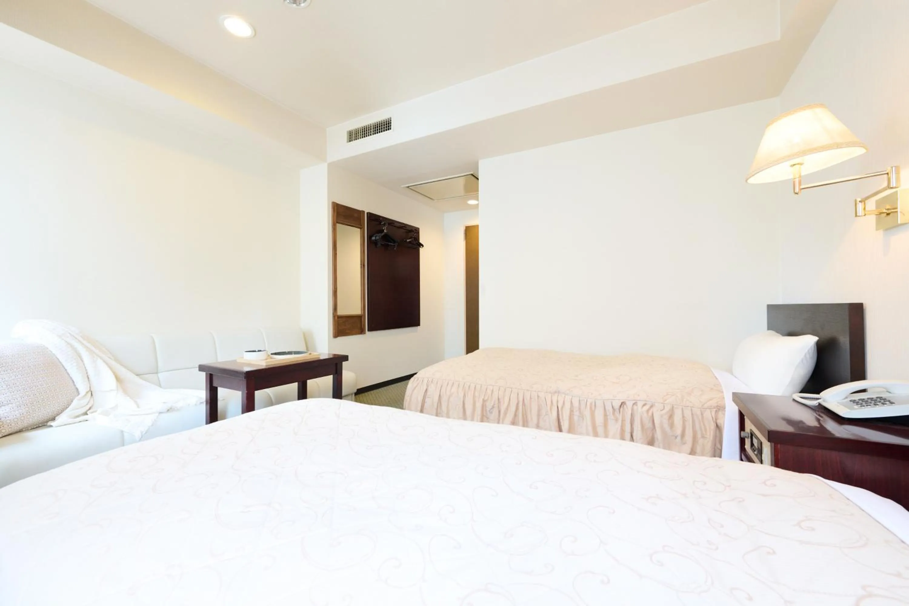 Bed in Hotel Sho Sapporo