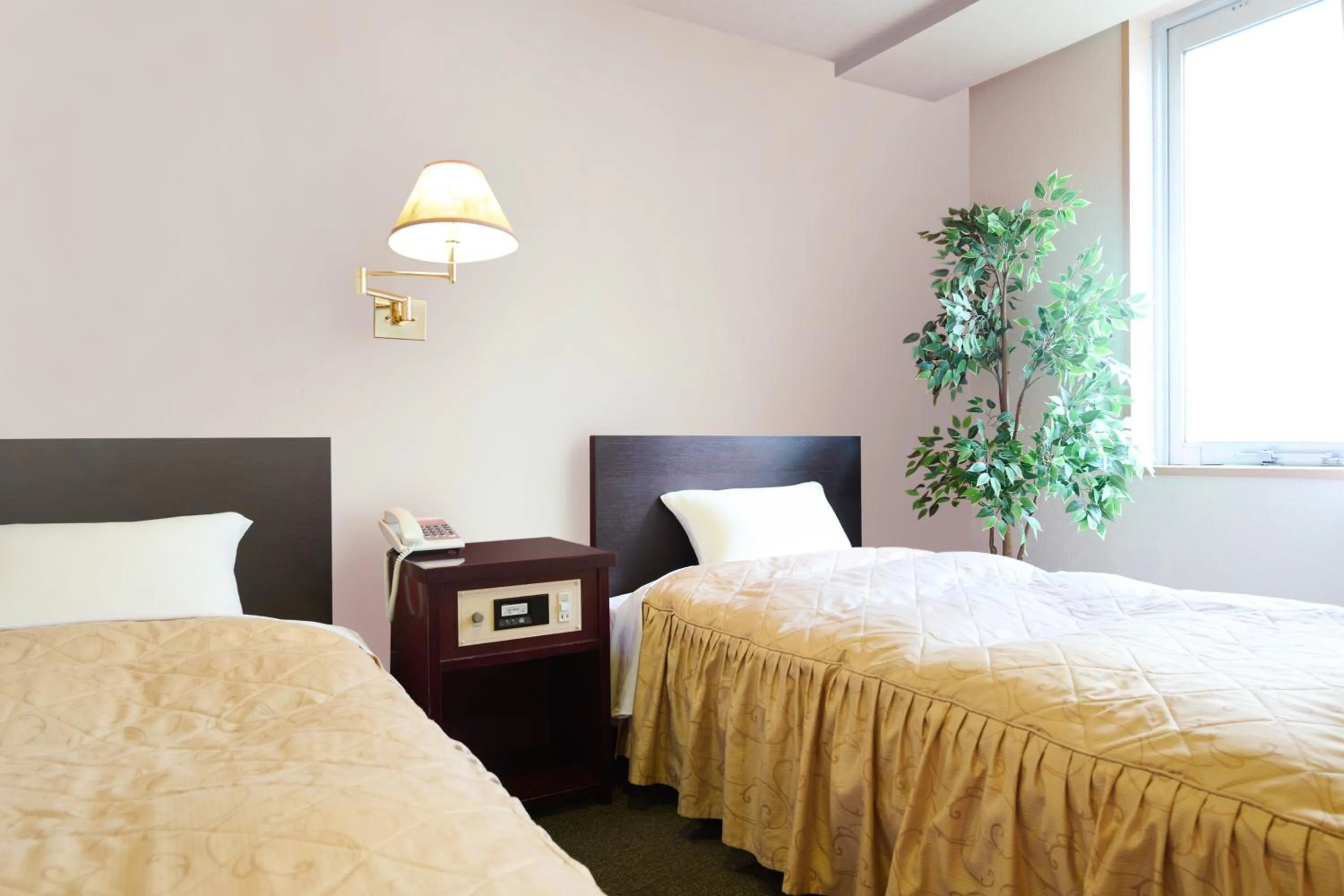 Bed in Hotel Sho Sapporo