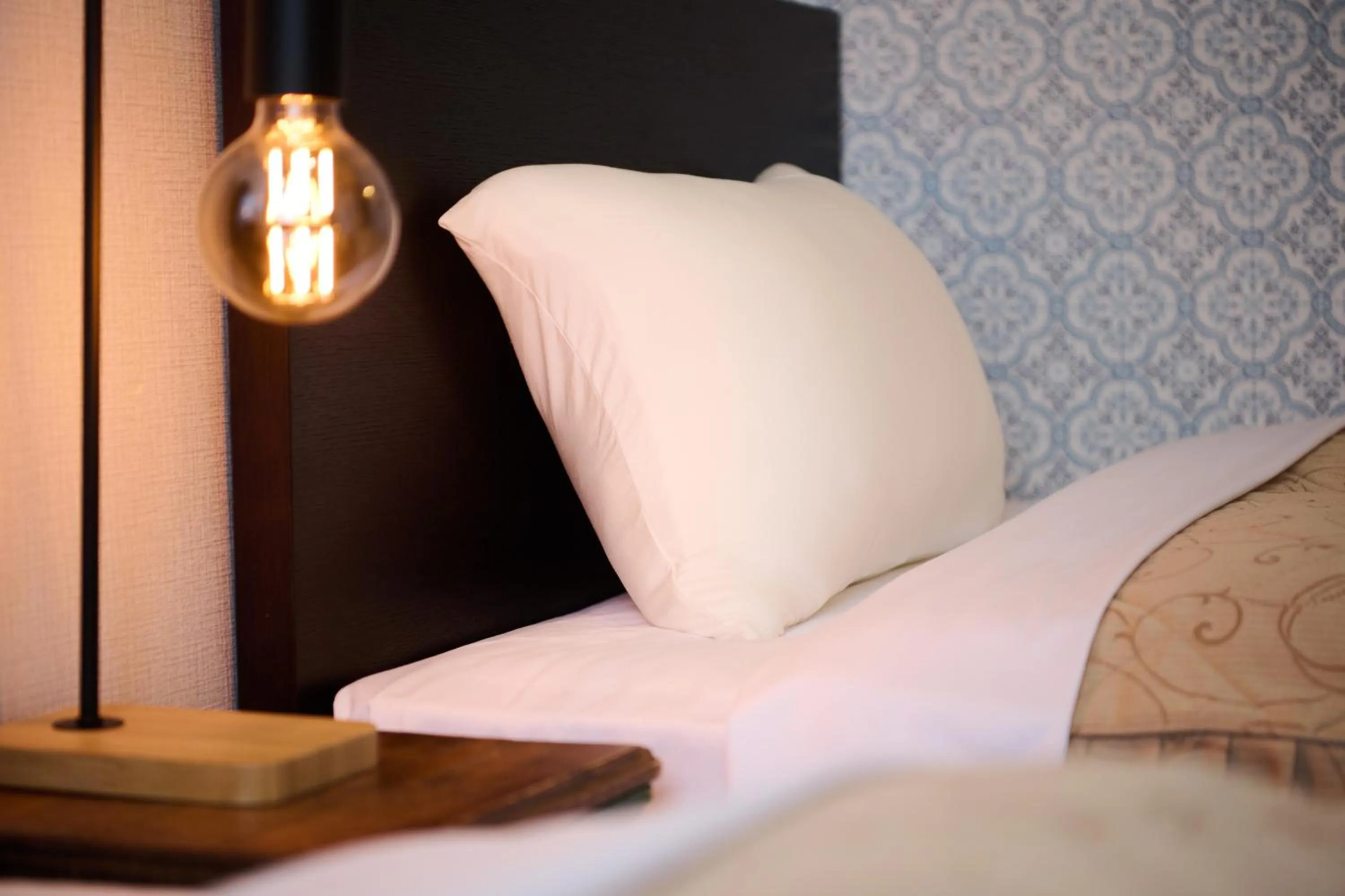 Bed in Hotel Sho Sapporo