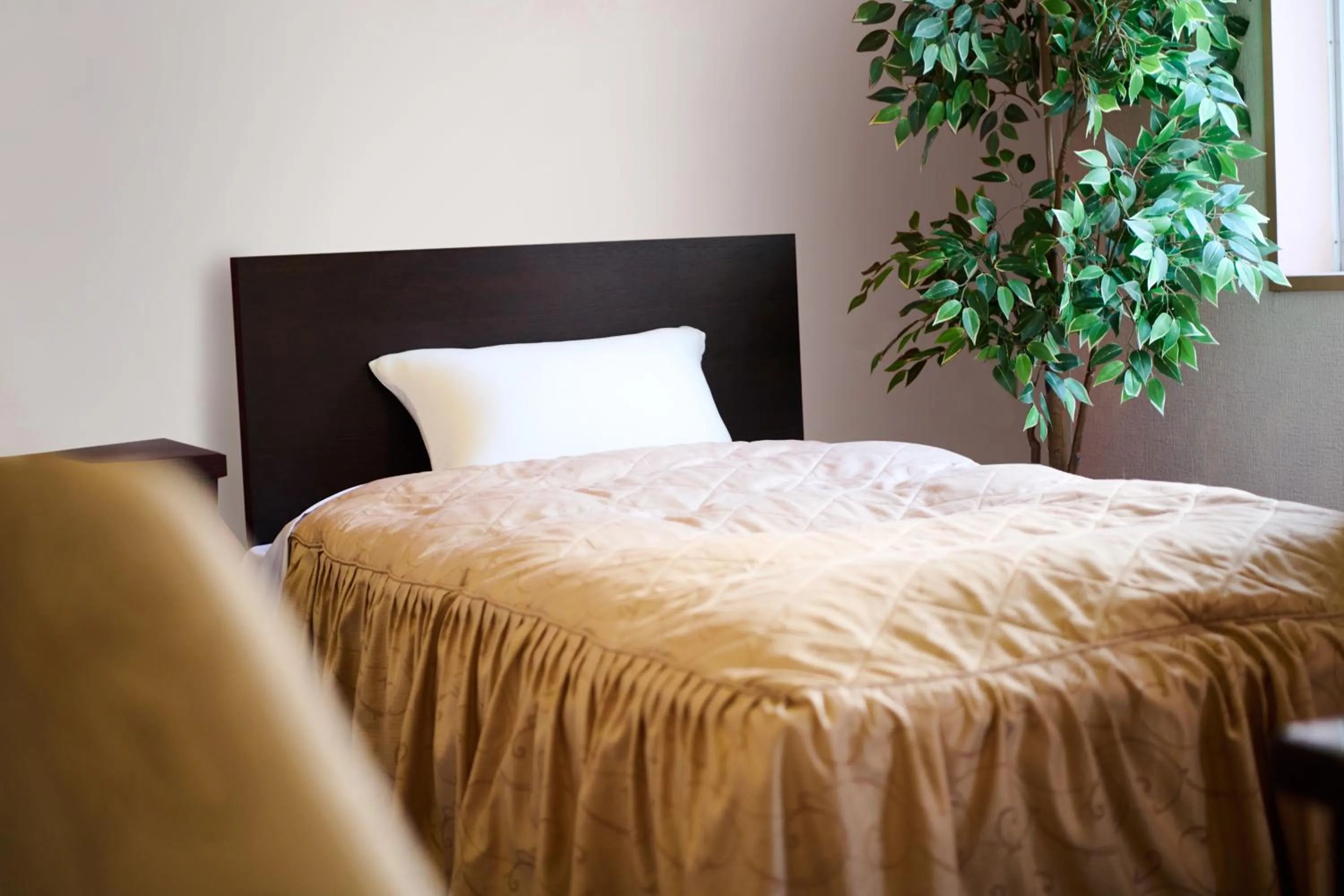 Bed in Hotel Sho Sapporo