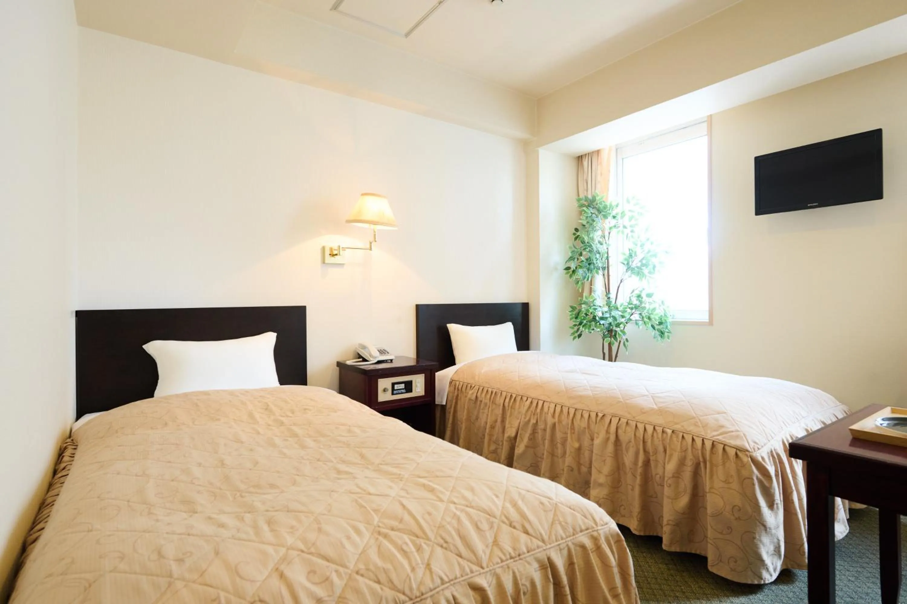 Bed in Hotel Sho Sapporo