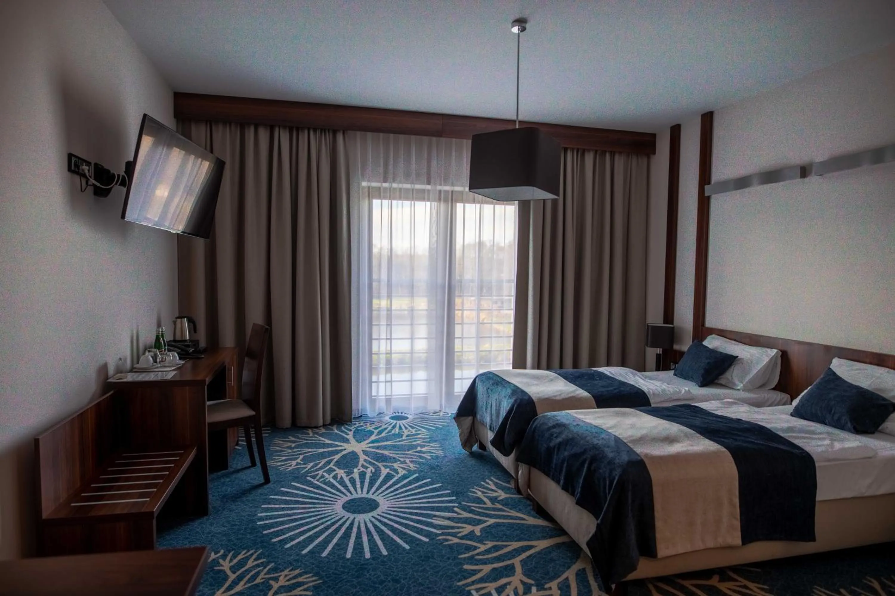Deluxe Twin Room Apartments Building in Kasor Resort & Spa