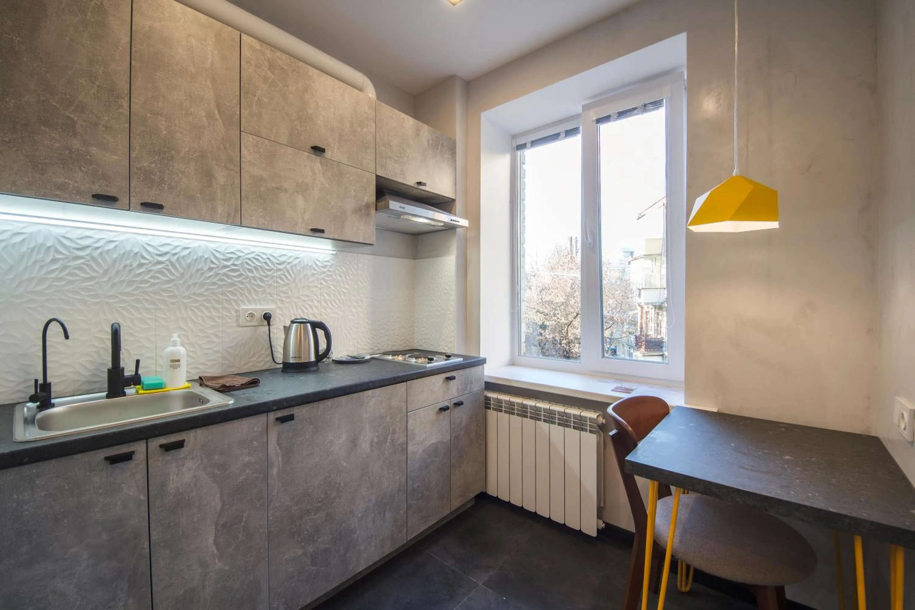 Kitchen or kitchenette in Central Dayflat Apartments