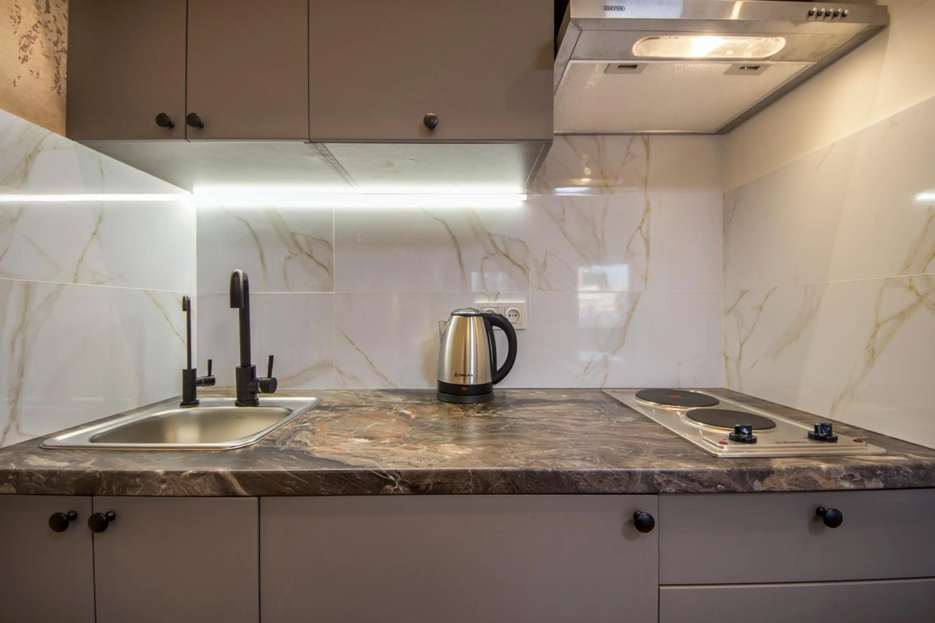 Kitchen or kitchenette in Central Dayflat Apartments