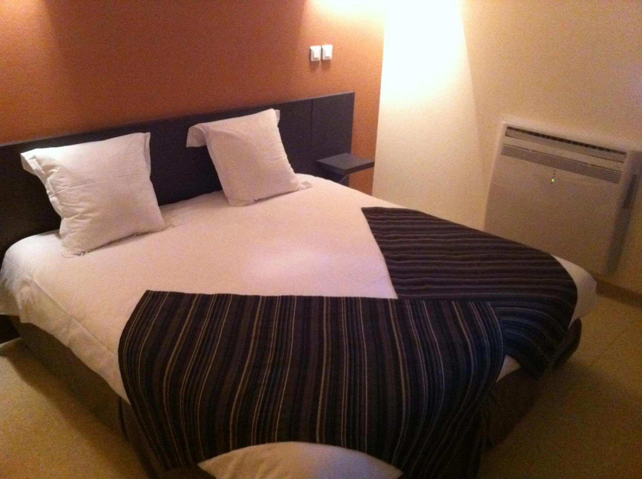 Bed in Fasthôtel Le Râle Des Genêts - Un hôtel FH Collection