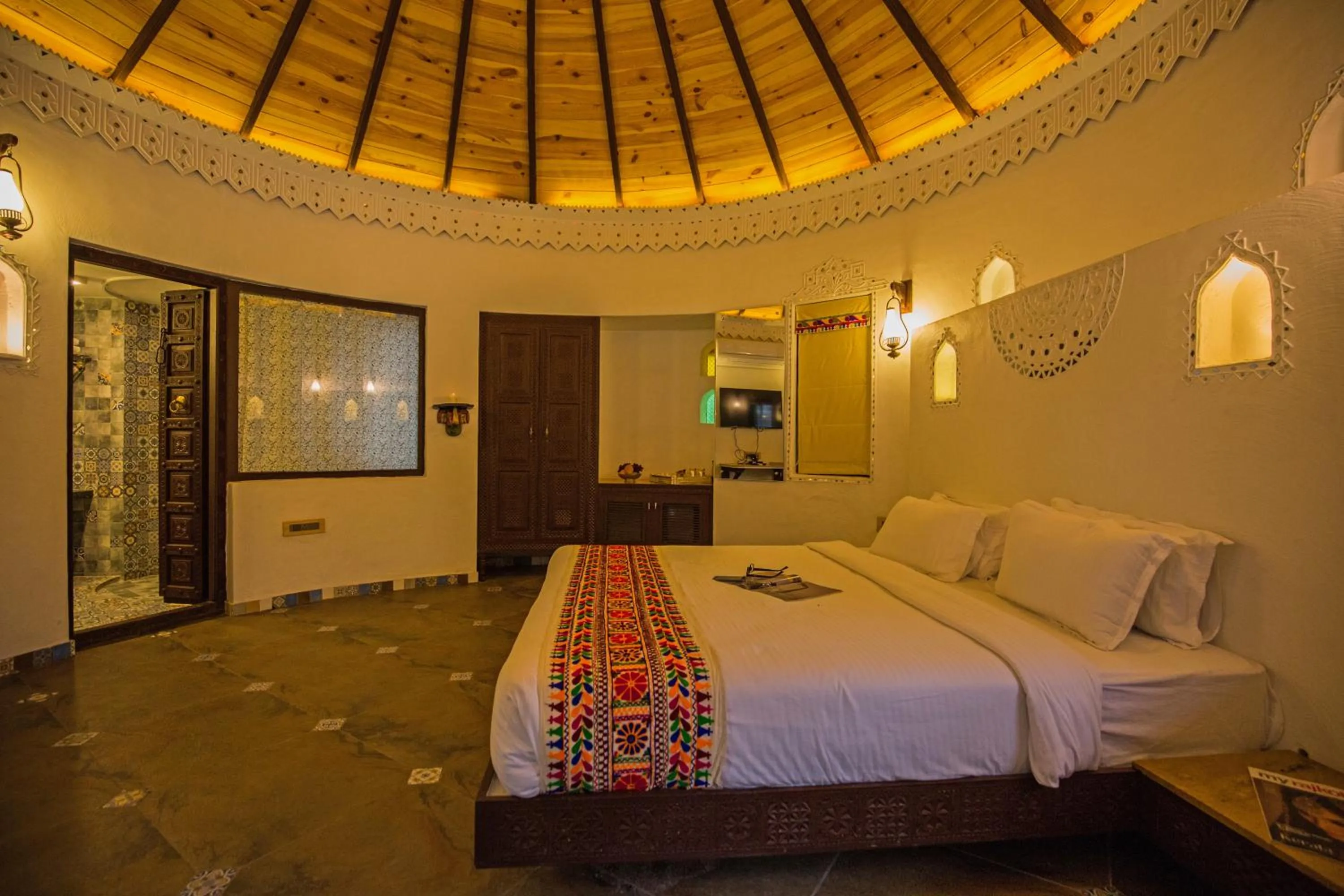 Bedroom in Nirali Resorts