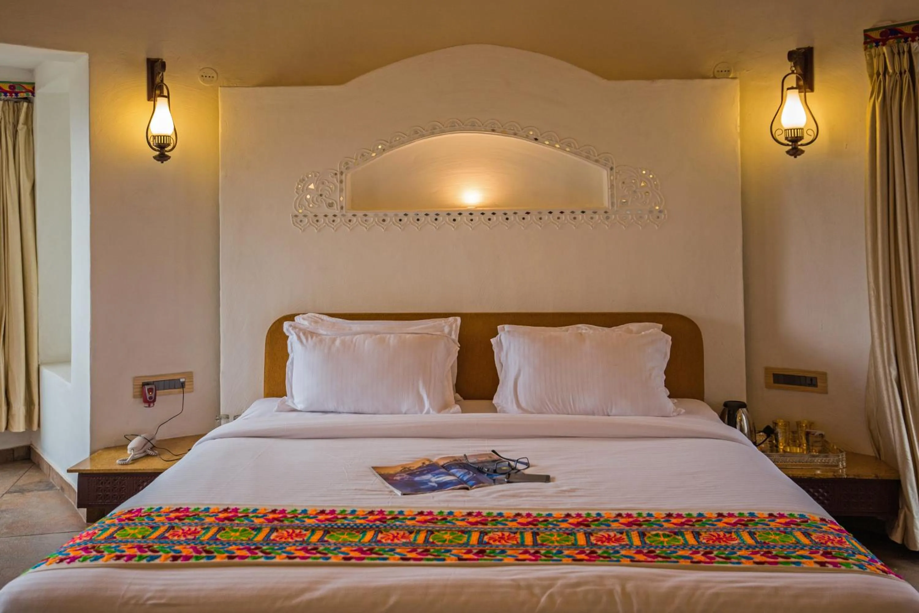 Bedroom in Nirali Resorts