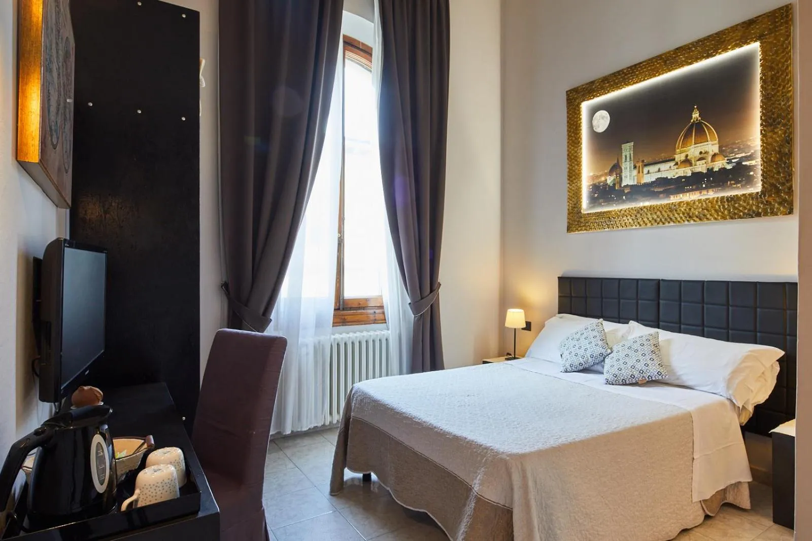 Bed in Leone X Guest House