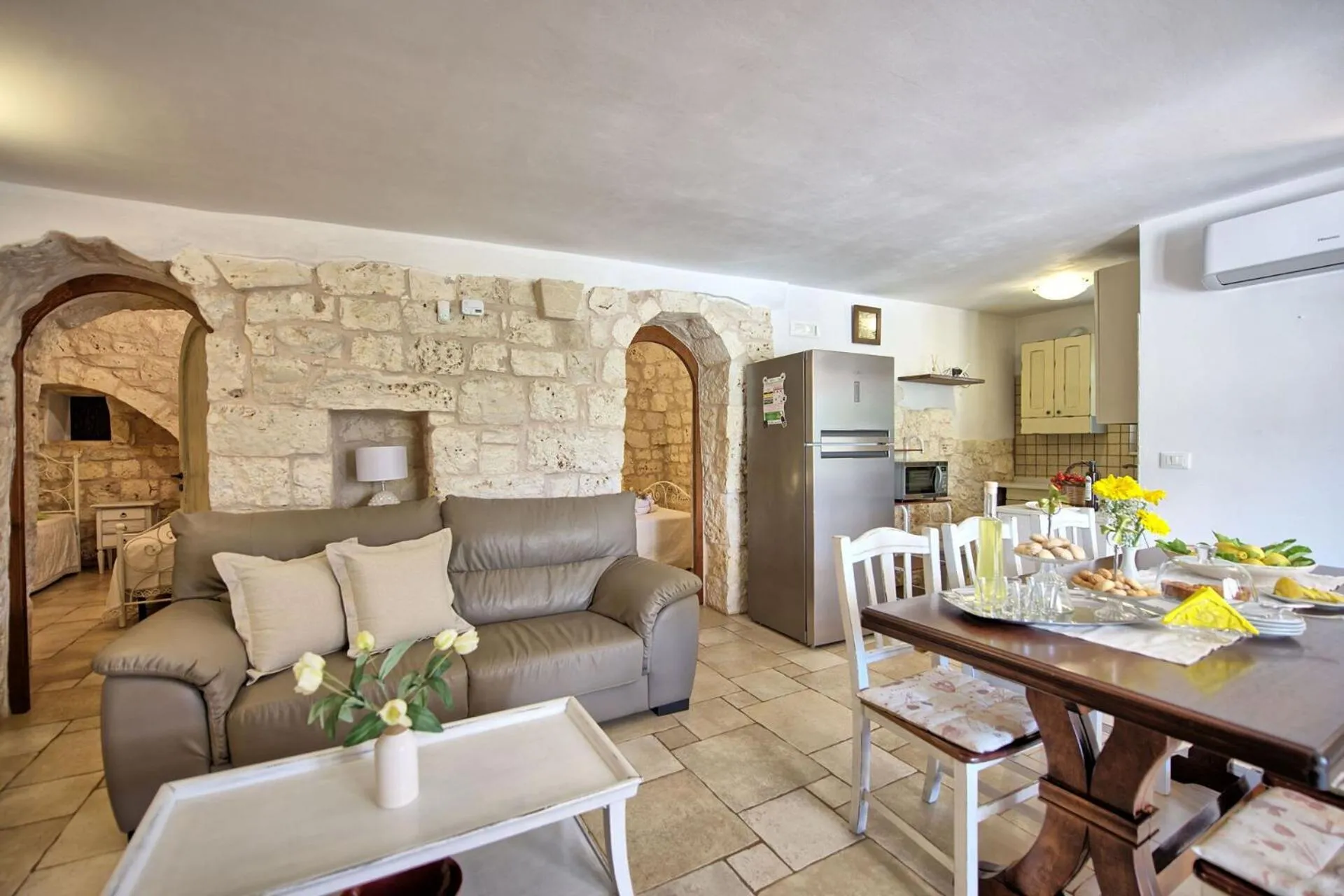 Kitchen or kitchenette in Trullo Santo Stefano by PosarelliVillas