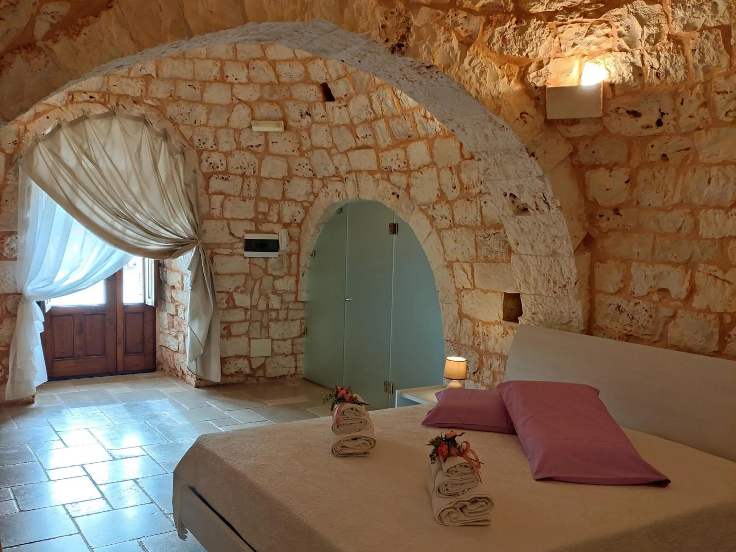 Bed in Trullo Santo Stefano by PosarelliVillas