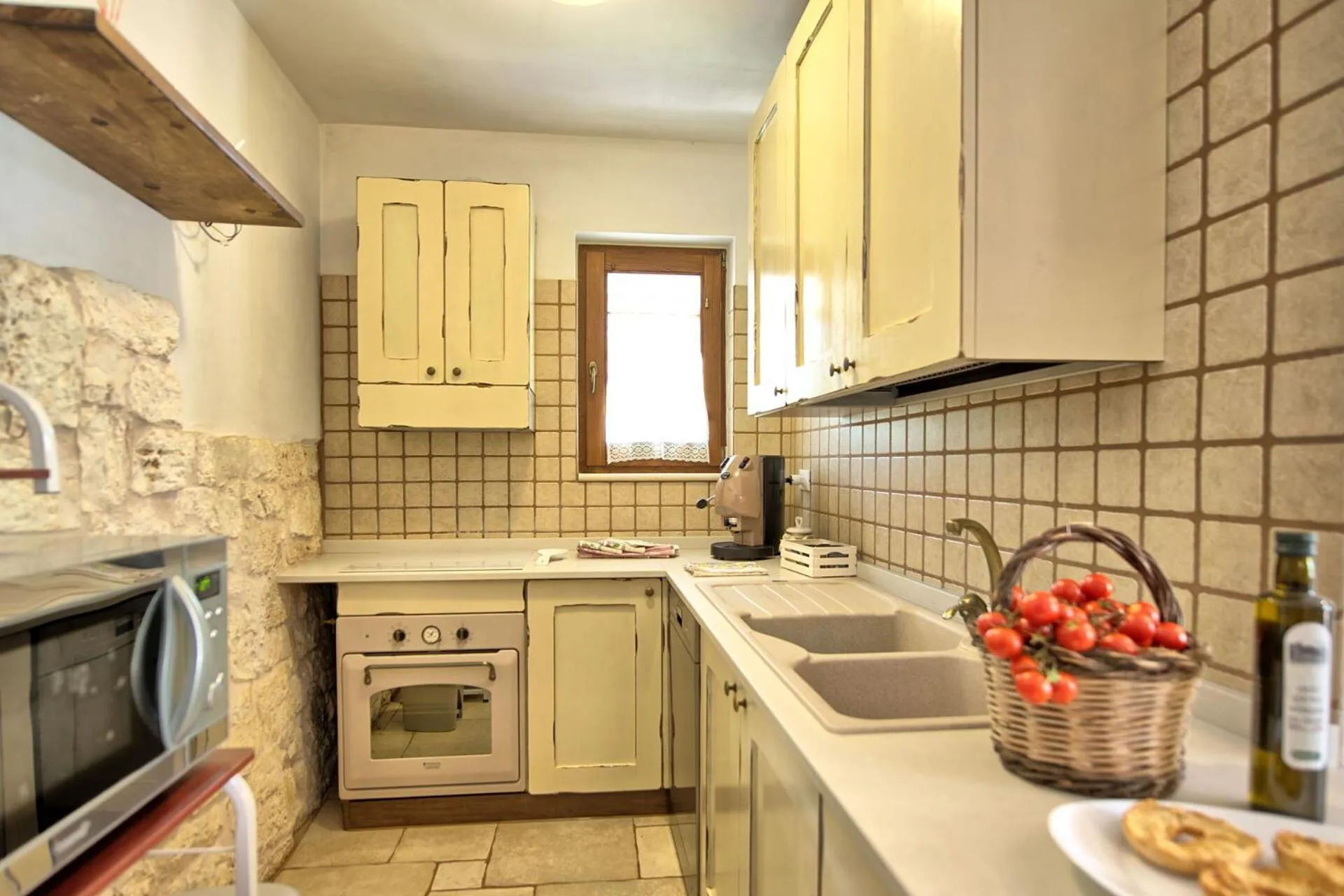 Kitchen or kitchenette in Trullo Santo Stefano by PosarelliVillas