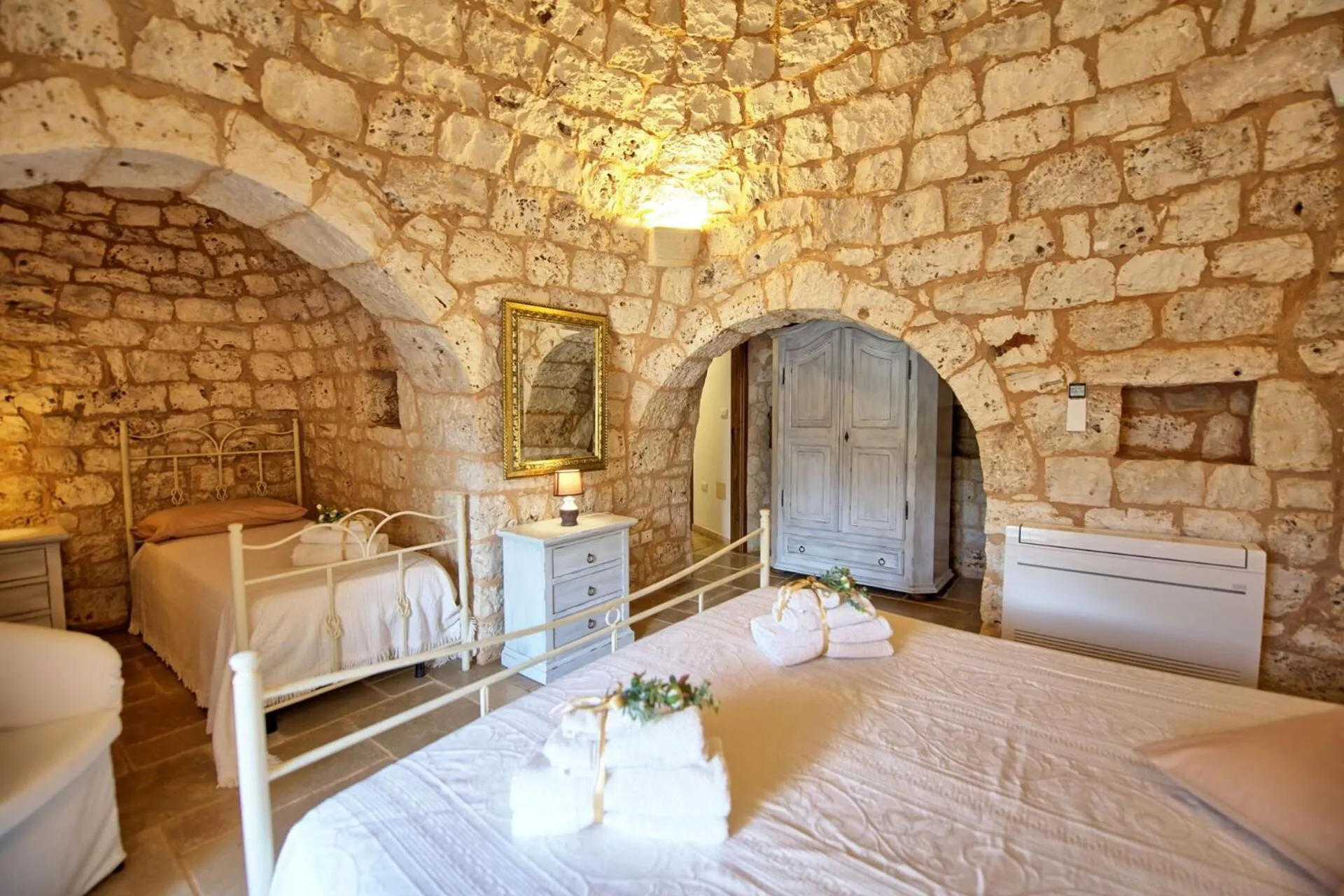 Bed in Trullo Santo Stefano by PosarelliVillas