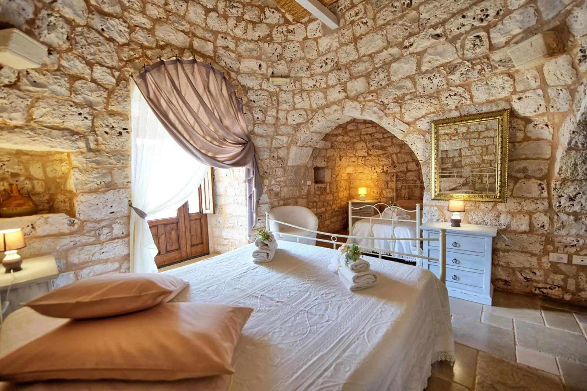 Bed in Trullo Santo Stefano by PosarelliVillas