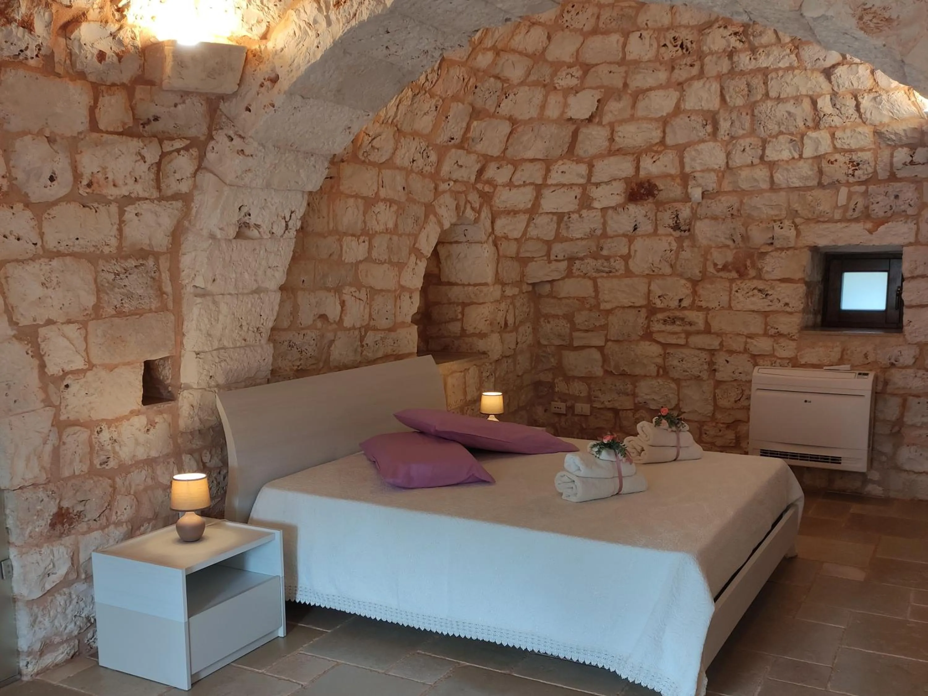 Bed in Trullo Santo Stefano by PosarelliVillas