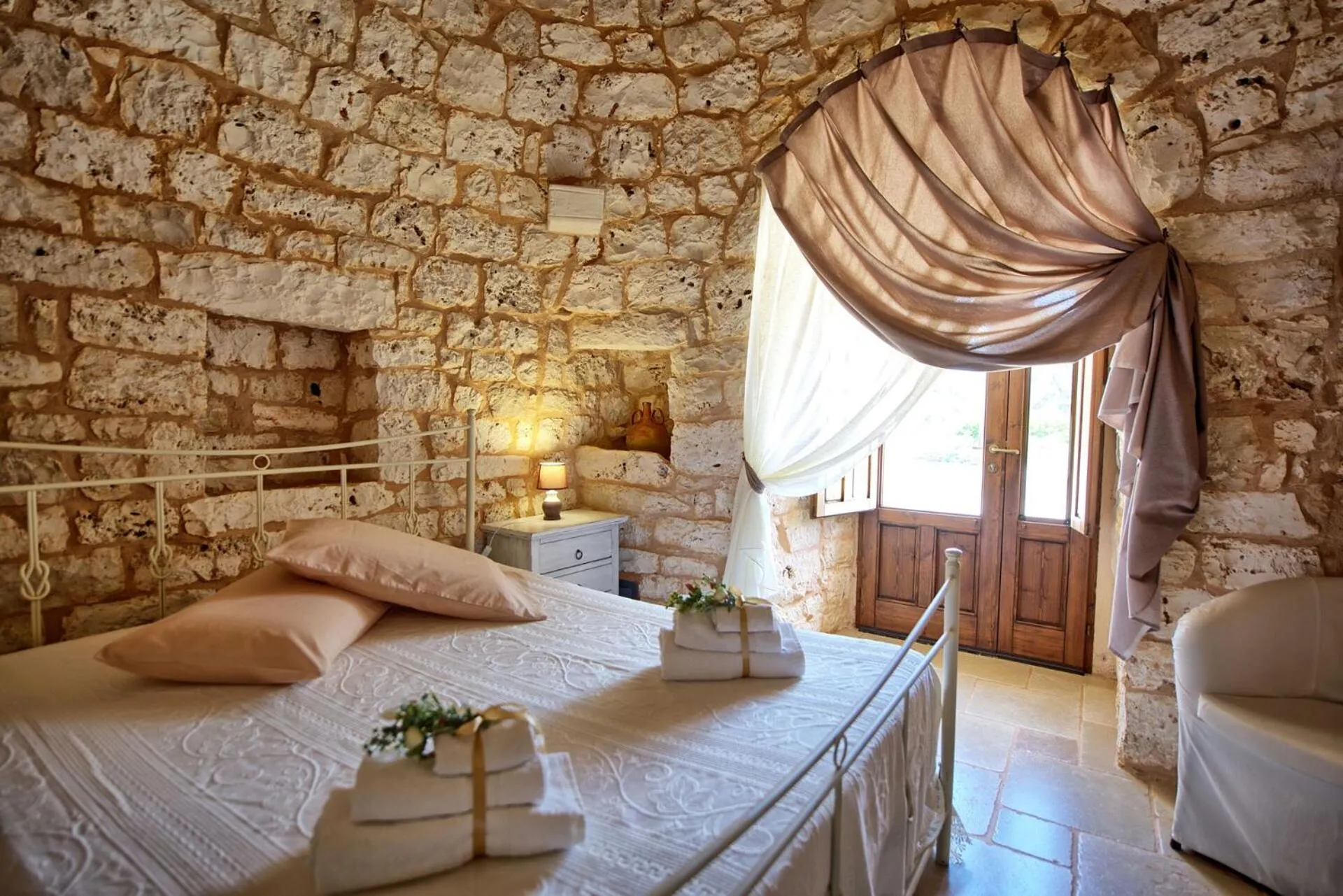 Bed in Trullo Santo Stefano by PosarelliVillas