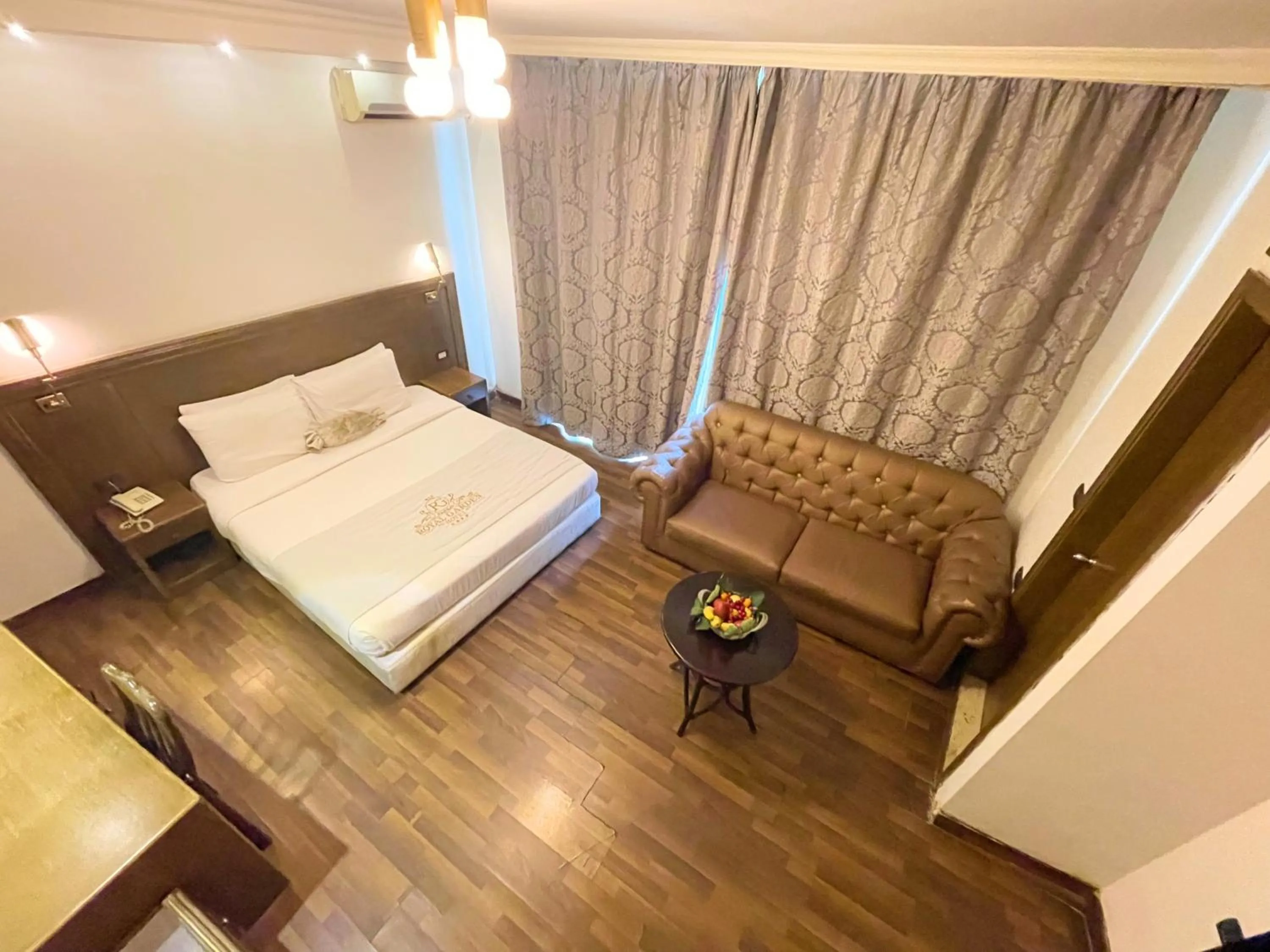 Bed in Royal Garden Hotel