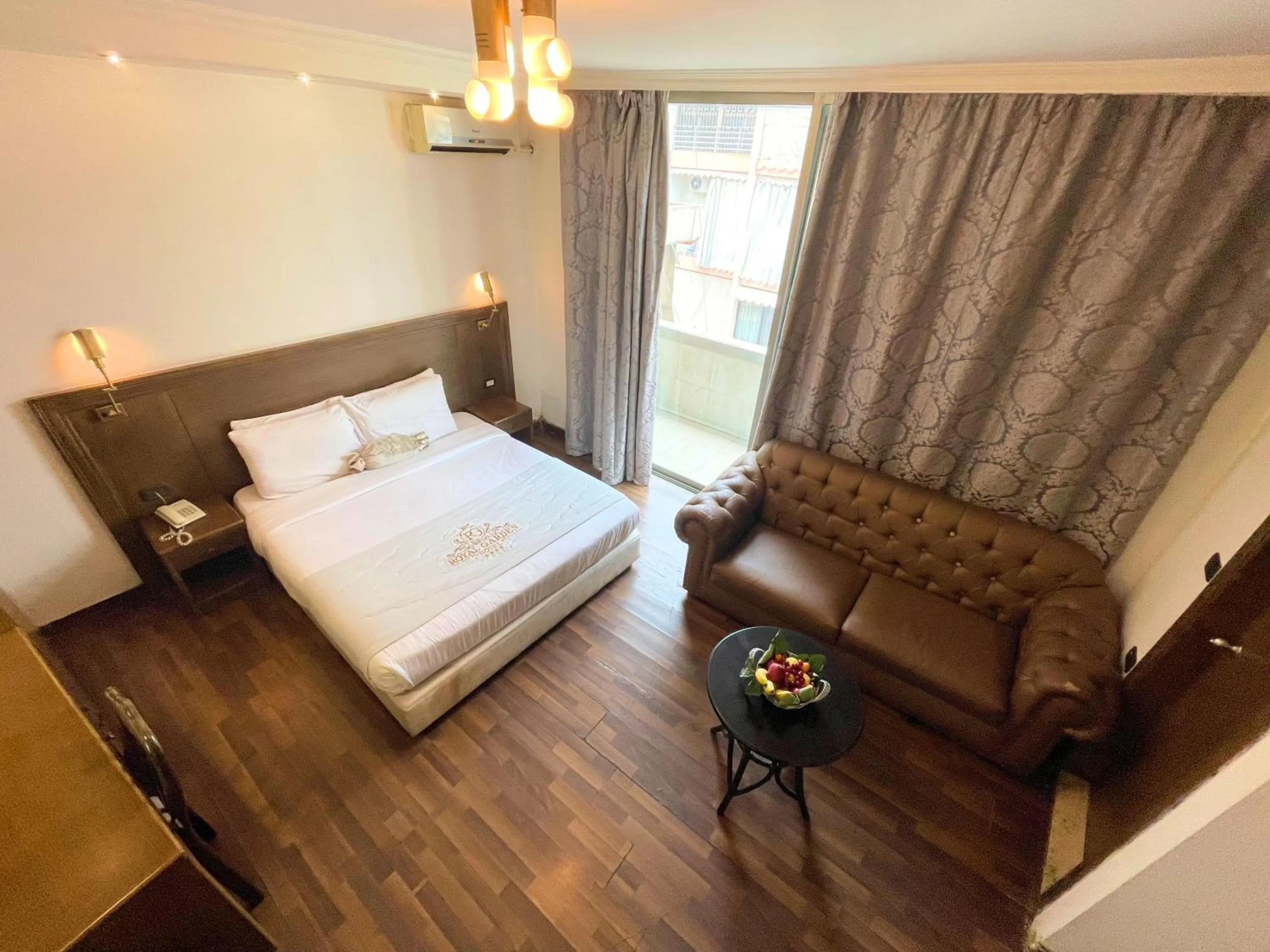 Bed in Royal Garden Hotel