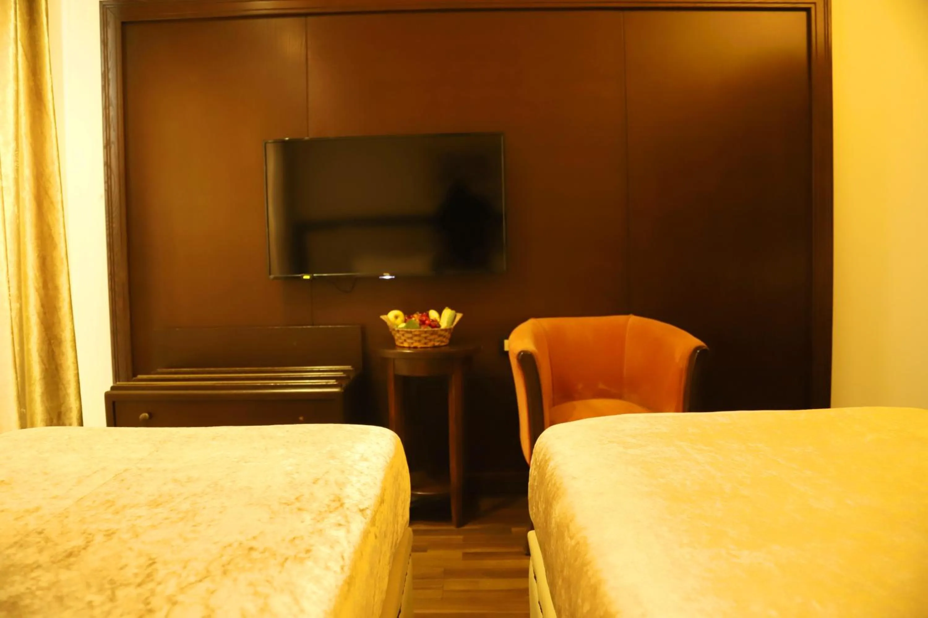 Bed in Royal Garden Hotel