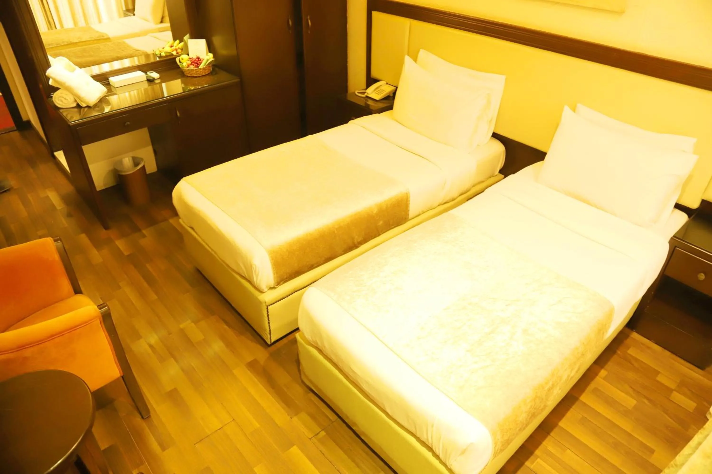 Bed in Royal Garden Hotel