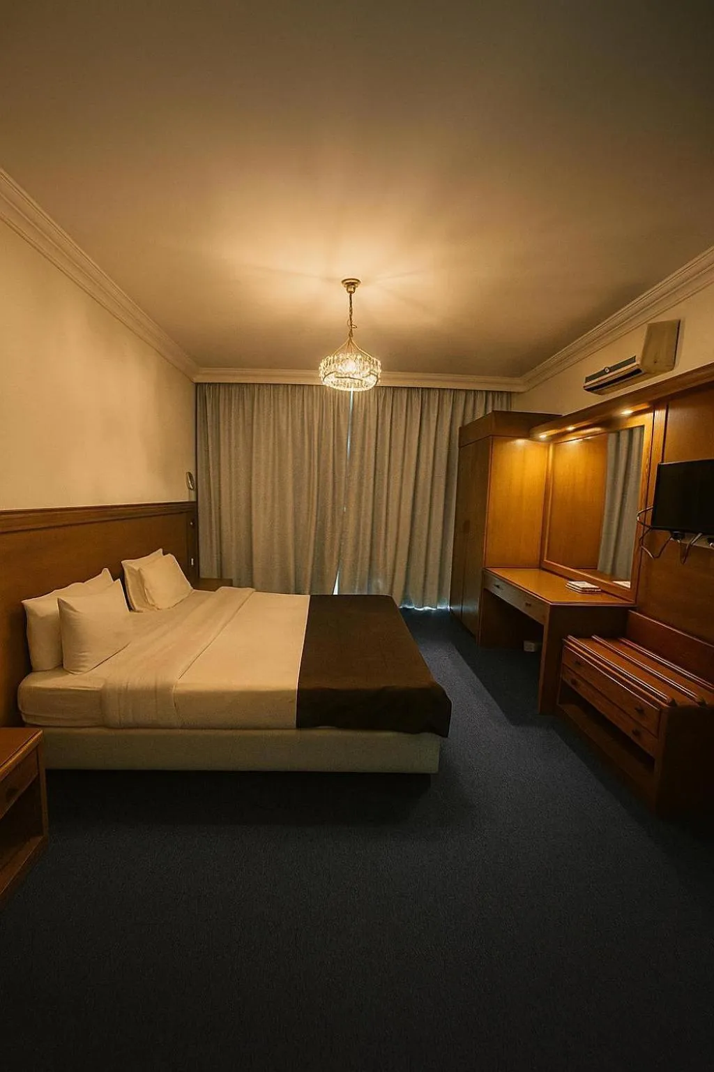 Bed in Royal Garden Hotel